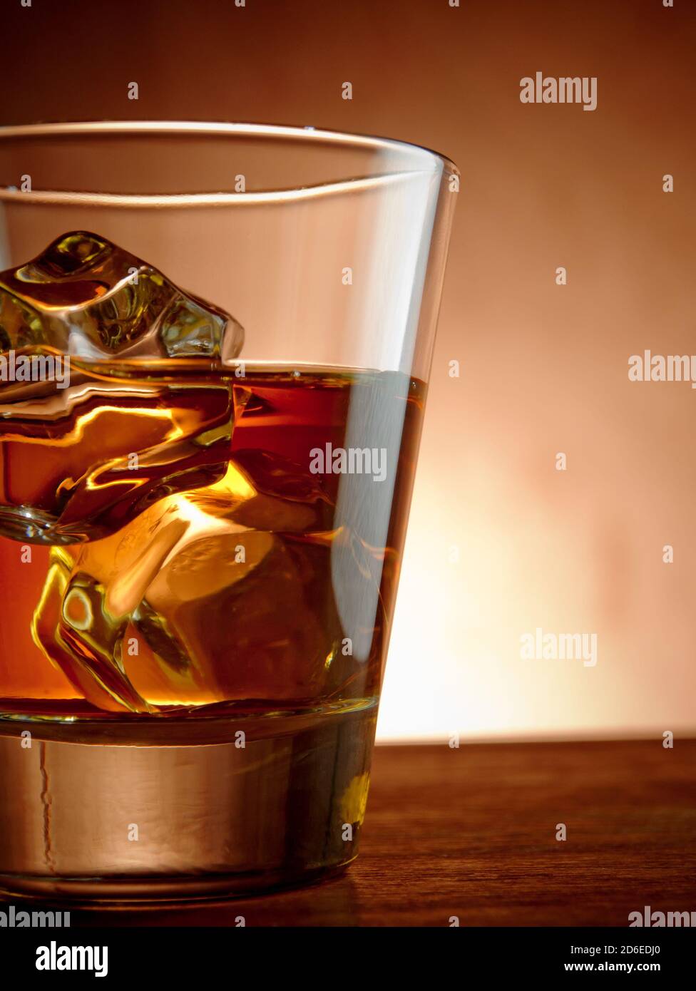 Glass of whiskey on the rocks Stock Photo - Alamy