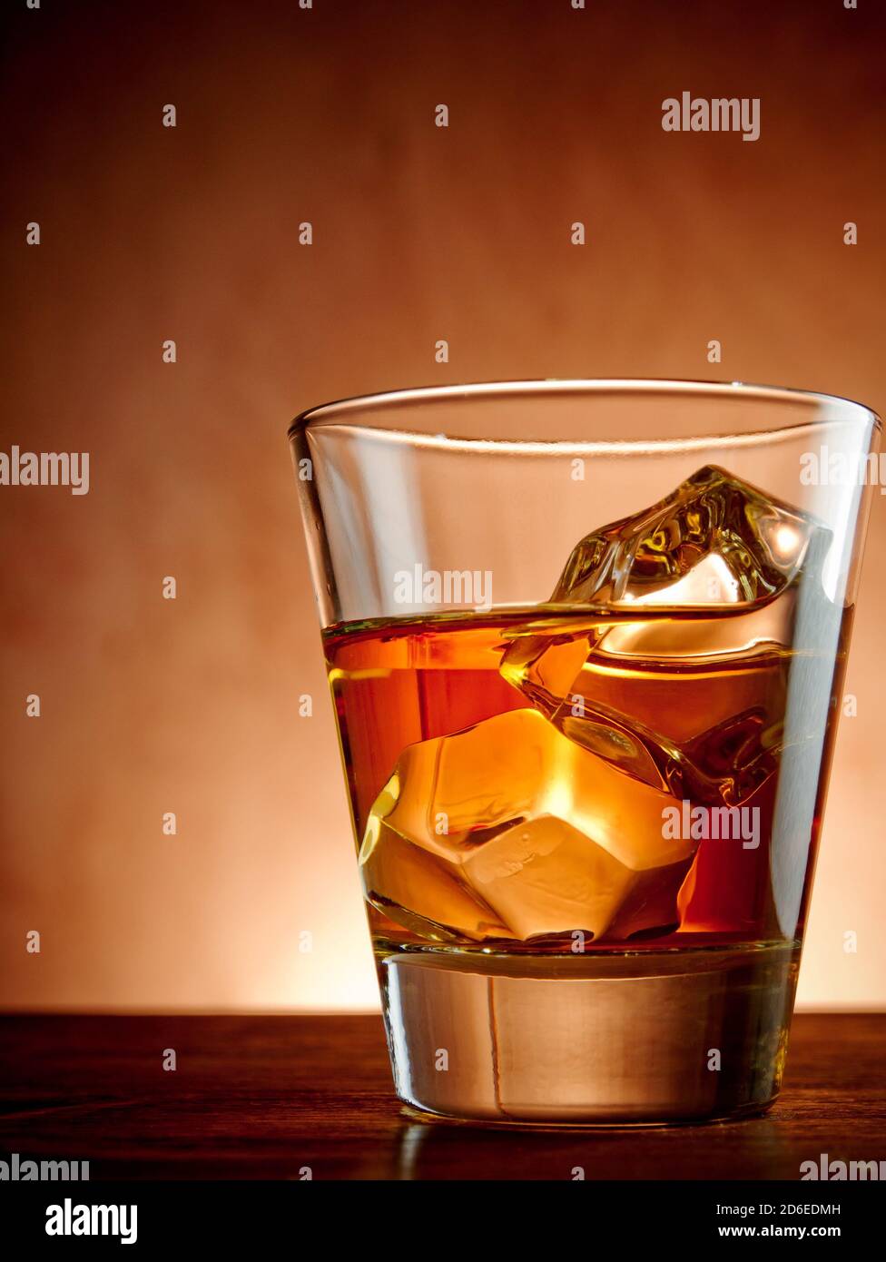 Glass of whiskey on the rocks Stock Photo - Alamy