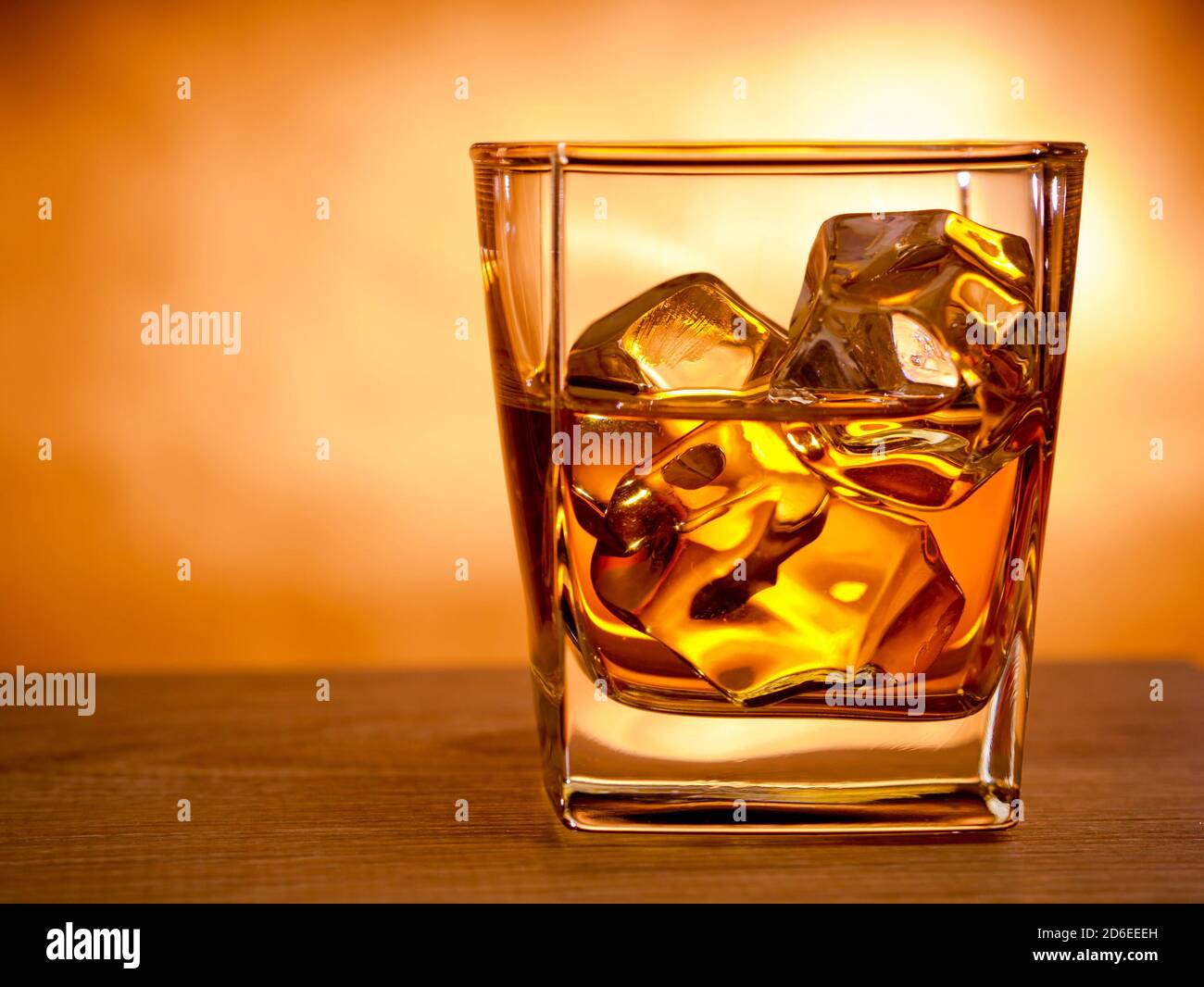 Glass of whiskey on the rocks Stock Photo - Alamy