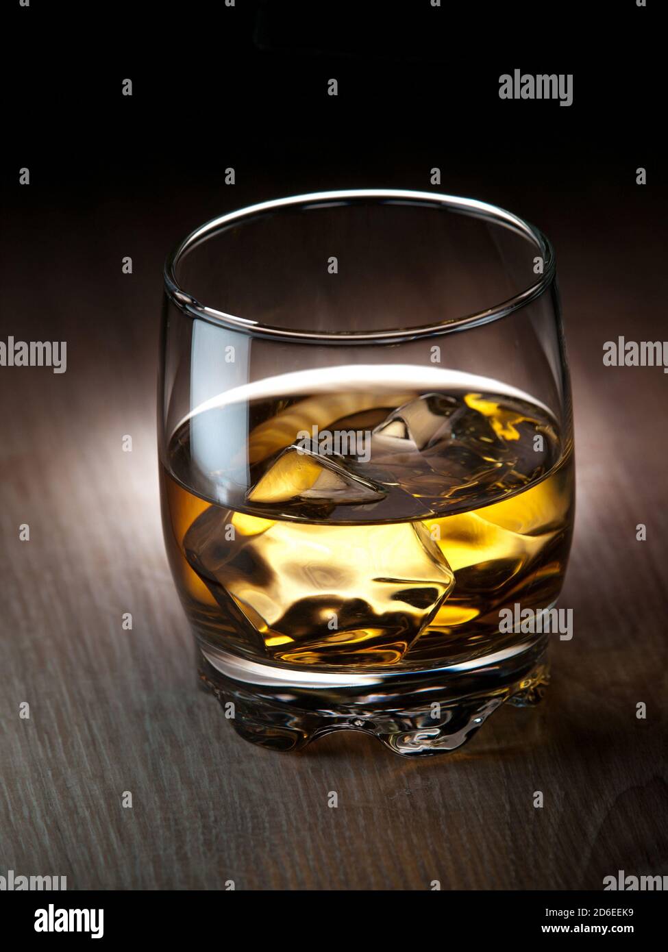 Glass of whiskey on the rocks Stock Photo - Alamy