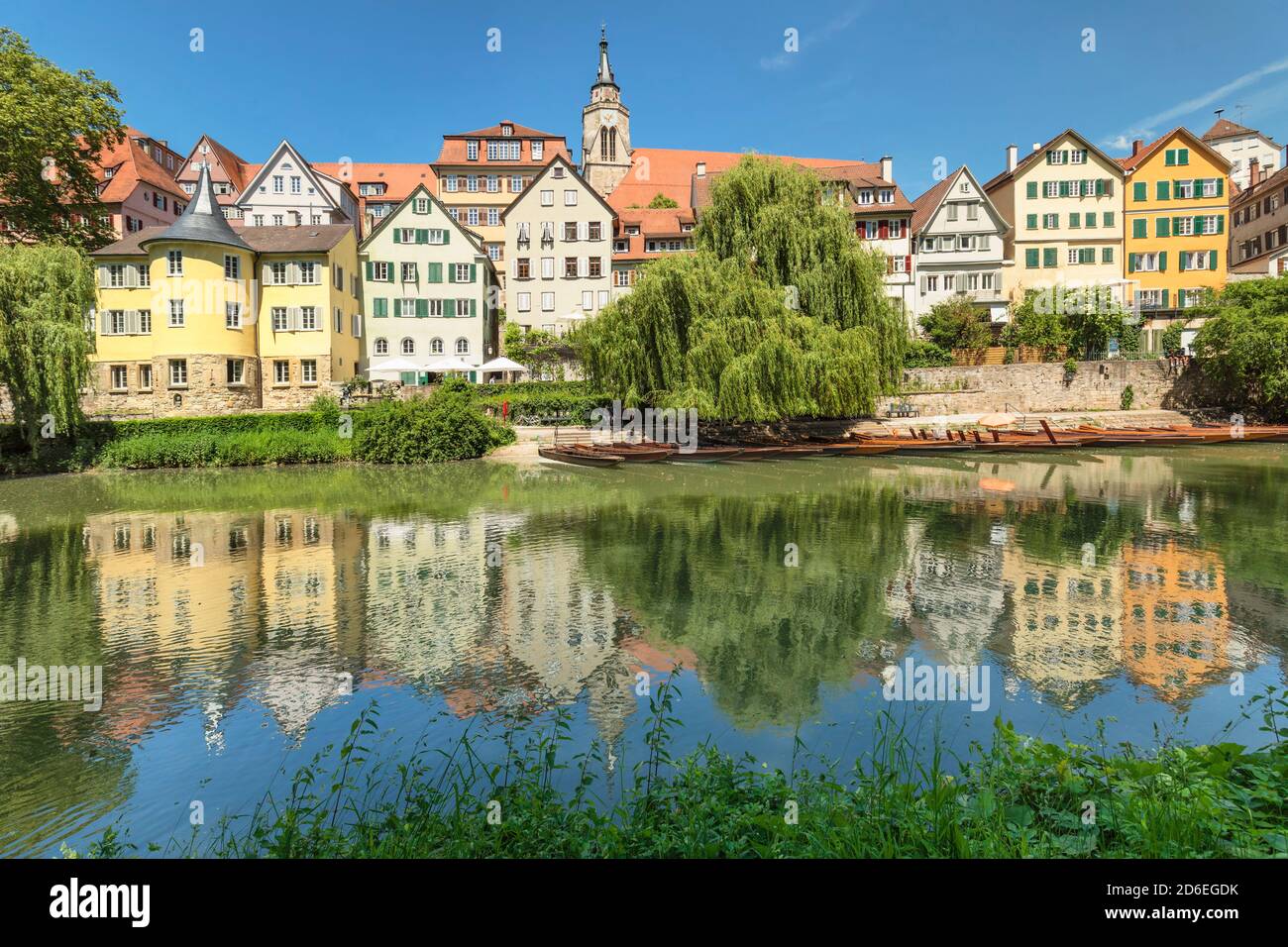 Tuebingen old town with Hölderlin tower and collegiate church reflected in the Neckar, Tuebingen