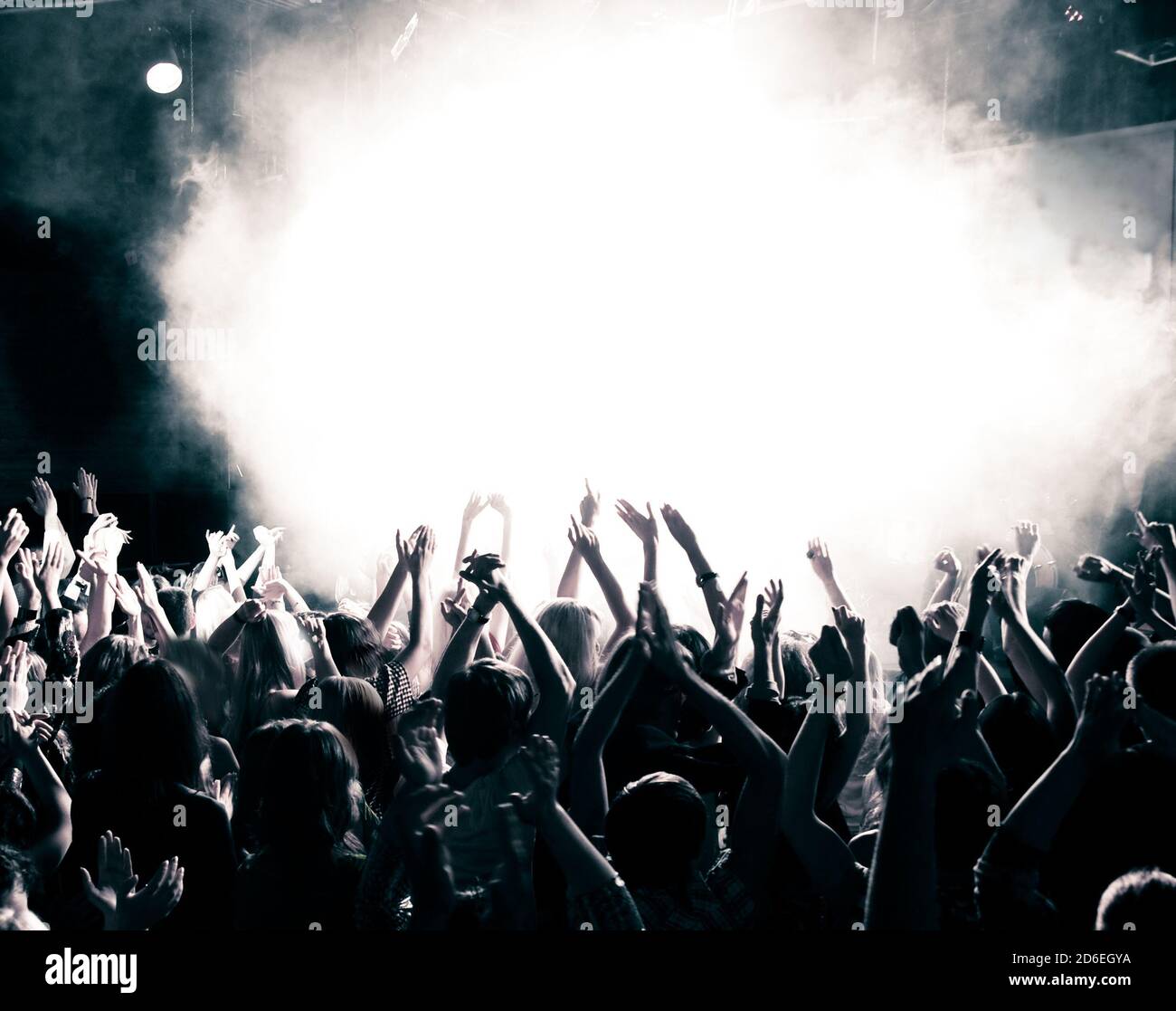 Concert crowd, hands up, toned Stock Photo Alamy
