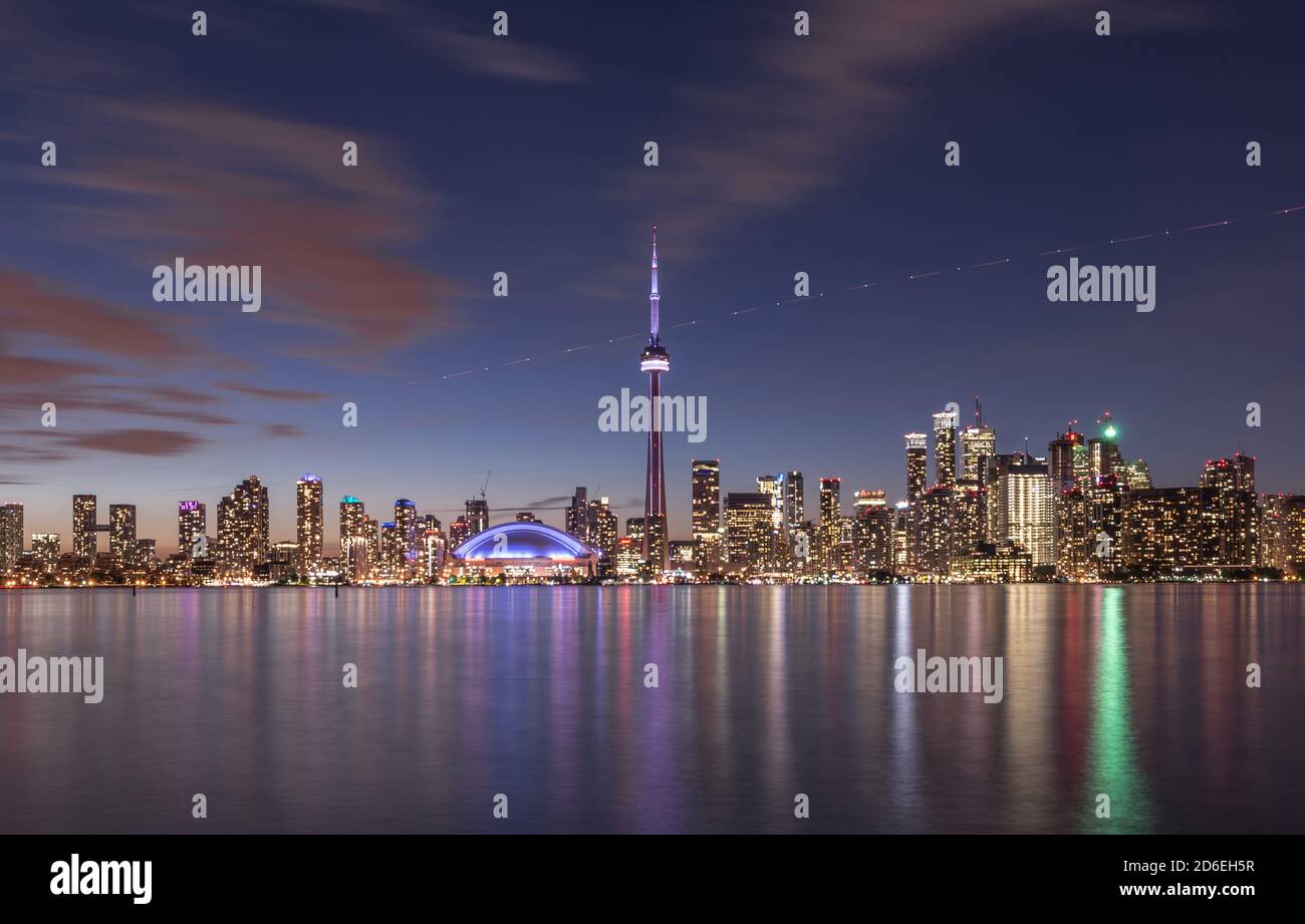 Toronto skyline with CN tower during dusk Stock Photo - Alamy