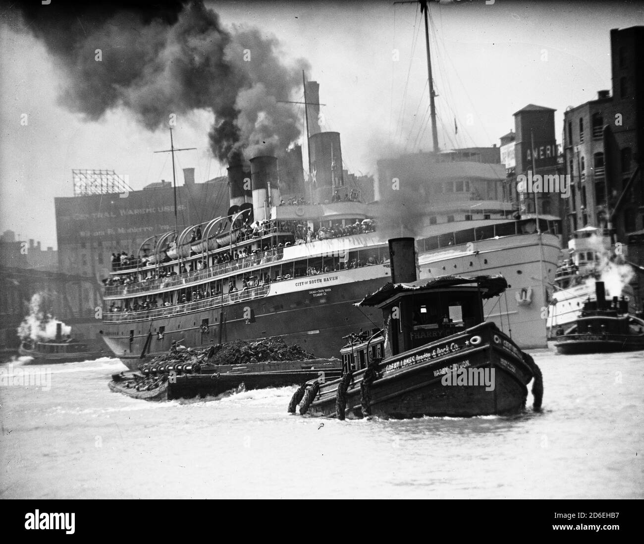 View of South Haven, Michigan tugboat and passenger ferry on the Chicago River, Chicago, Illinois, circa 1915. Stock Photo