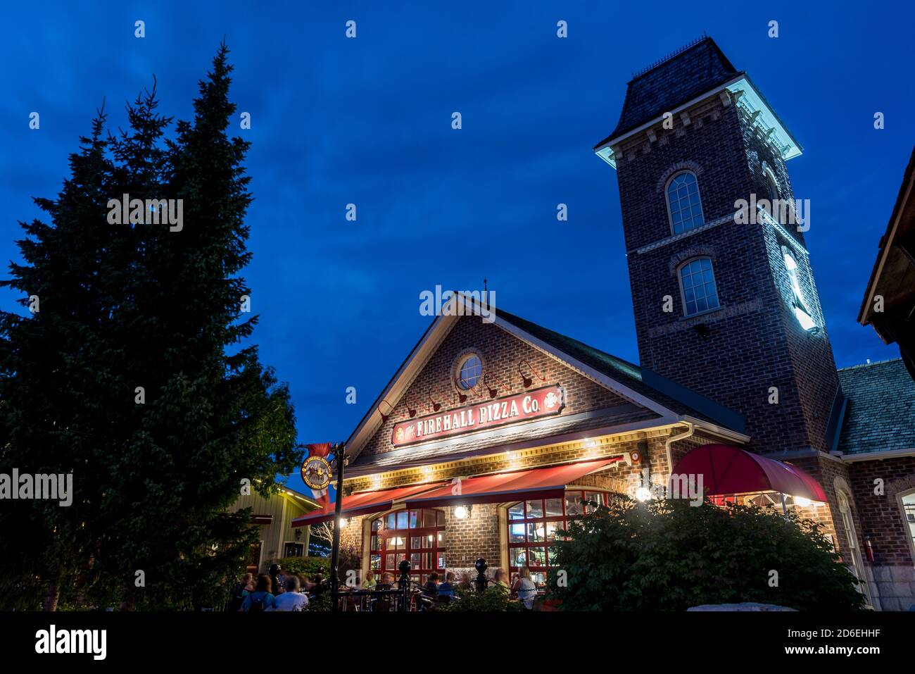 A night scene of Fire hall pizza restaurant at Blue mountain village. Stock Photo