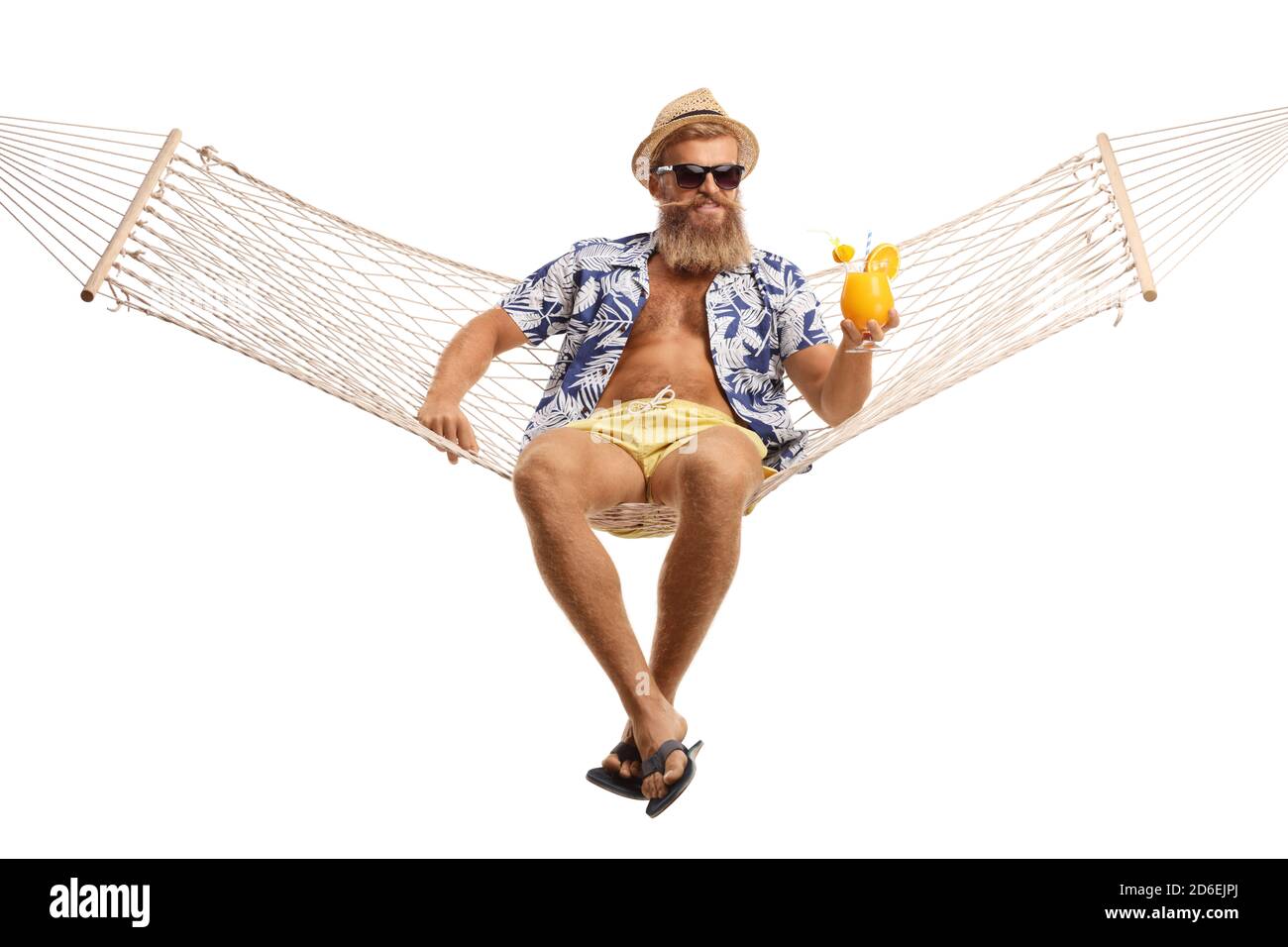 Young bearded man with hat and sunglasses sitting on a hammock swing with a cocktail isolated on white background Stock Photo