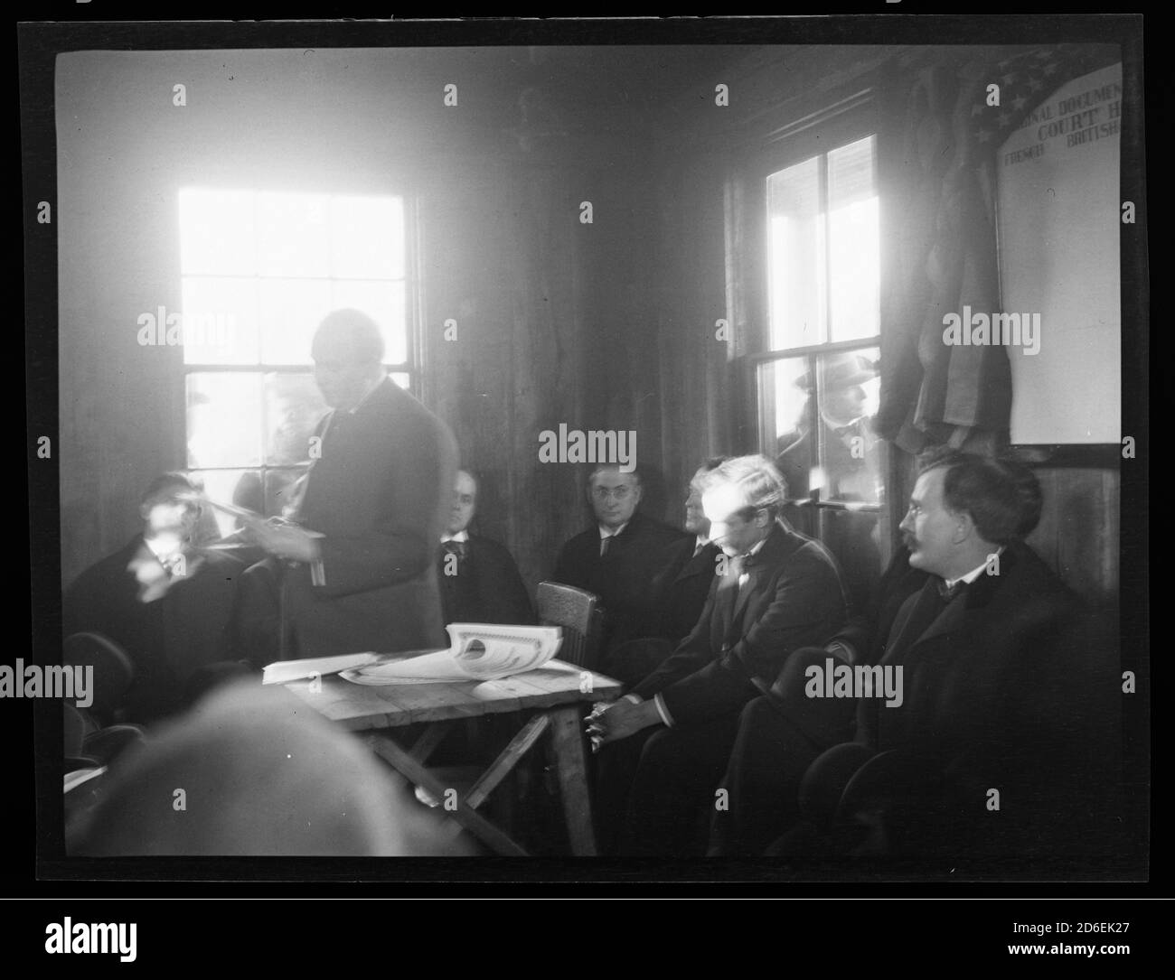 Municipal judges inside the relocated Cahokia Courthouse at the time of their commissioning, Jackson Park, Chicago, Illinois, November 1906. Stock Photo