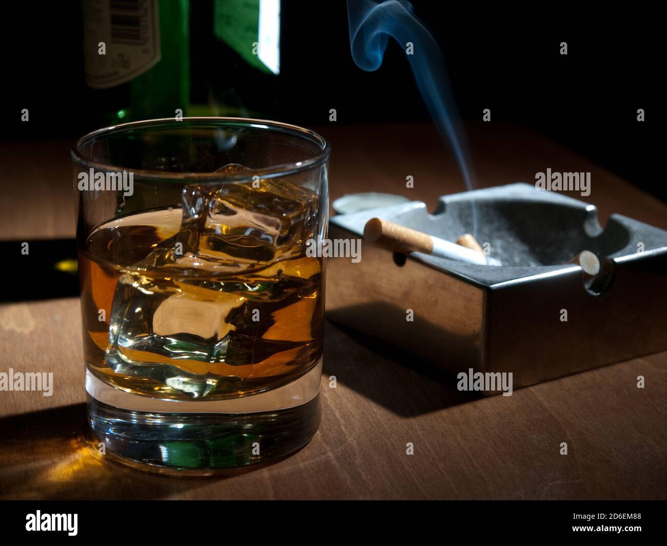 smoking and drinking, whiskey and cigarettes Stock Photo