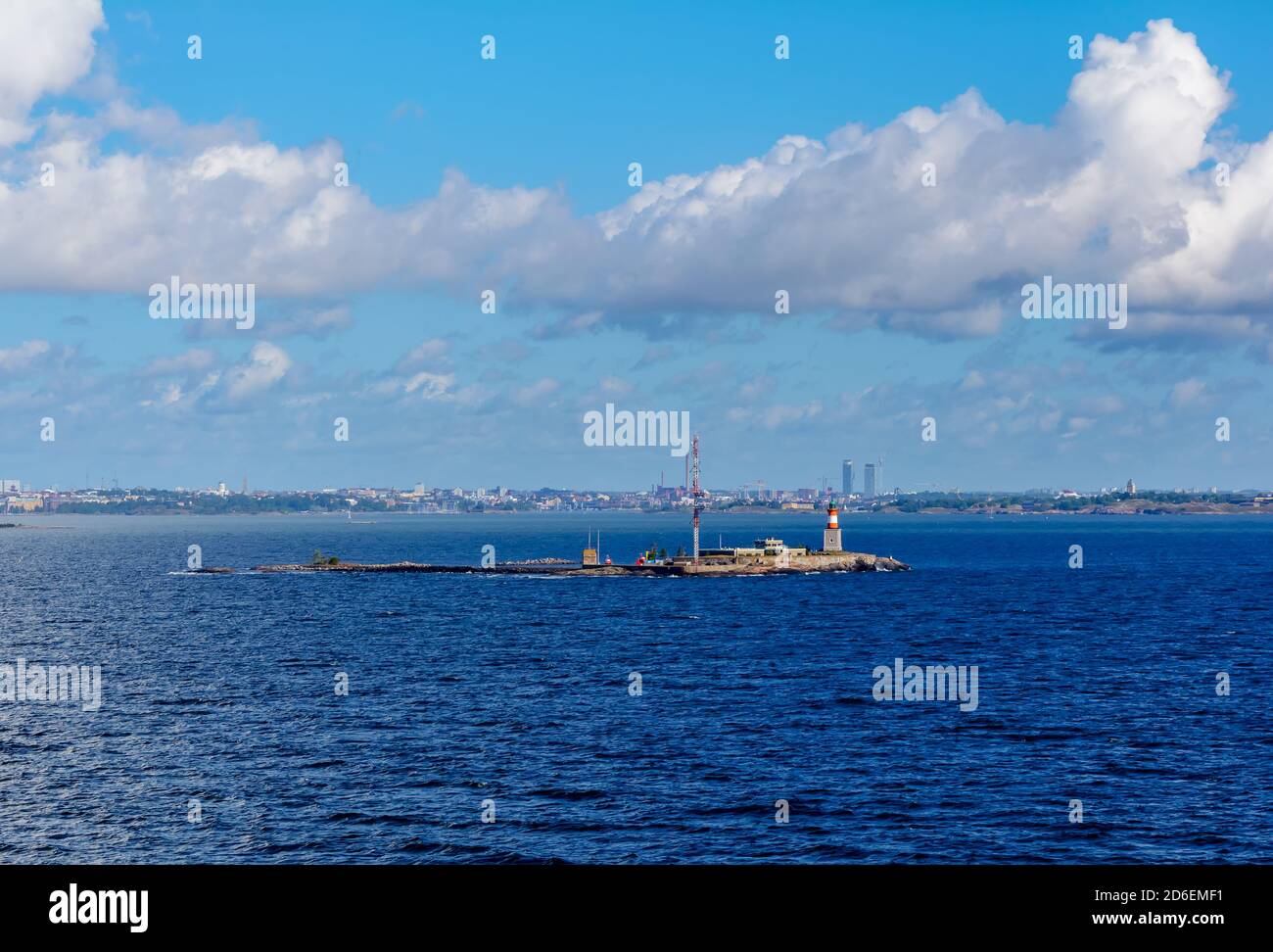 Small rocky island Harmaja with little lighthouse and metal tower in Gulf of Finland Stock Photo