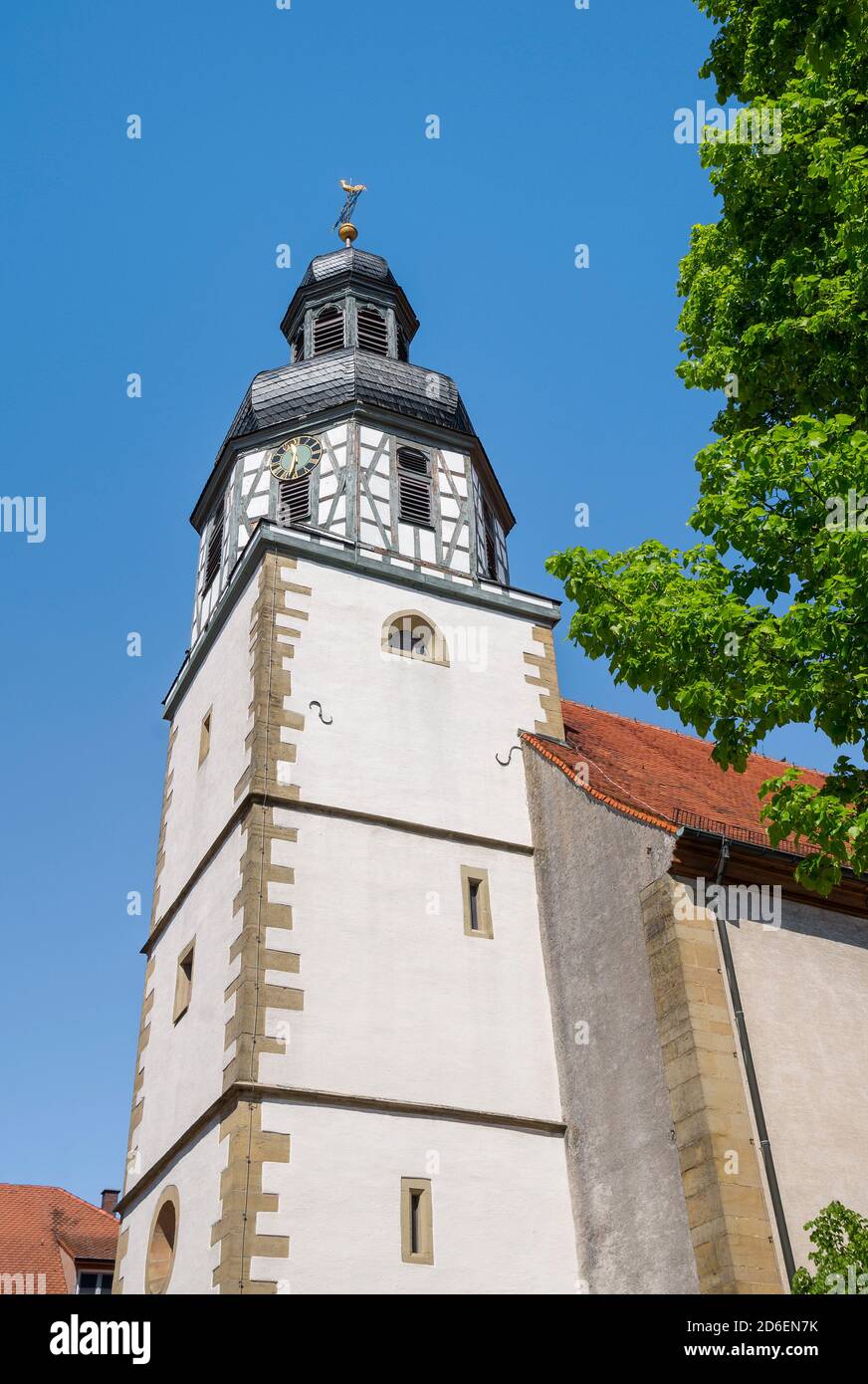 Germany, Baden-Wuerttemberg, Kraichtal-Gochsheim, St. Martinskirche, St. Martin Church, steeple with half-timbered tower and slate onion dome Stock Photo