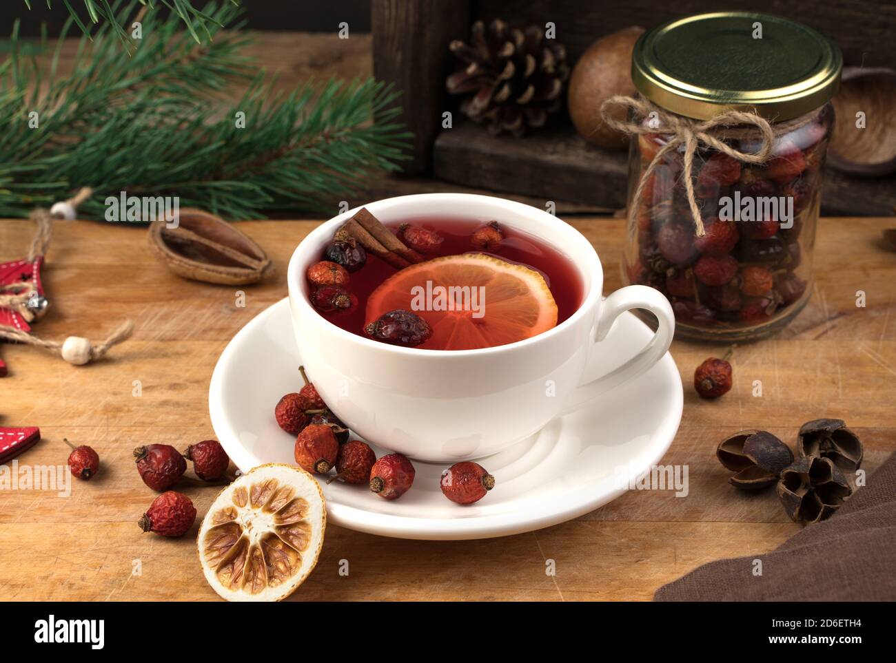 White tea Cup with lemon on Christmas background. Stock Photo