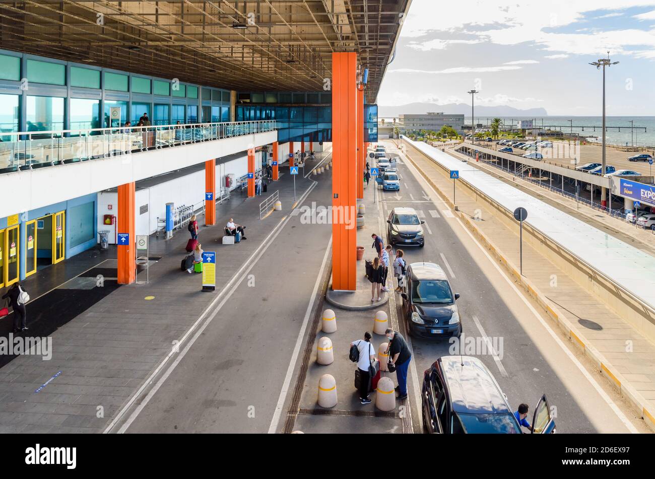 Palermo, Punta Raisi, Italy - September 29, 2020: Exterior of Palermo Falcone Borsellino Airport Departures terminal, with view of the parking and med Stock Photo