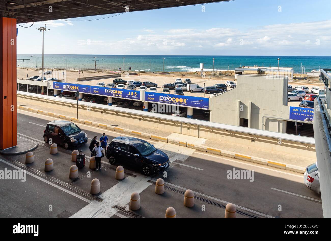 Palermo, Punta Raisi, Italy - September 29, 2020: Exterior of Palermo Falcone Borsellino Airport Departures terminal, with view of the parking and med Stock Photo
