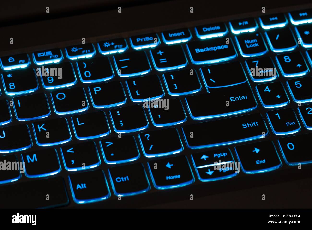 Computer keyboard glows red with a blue illuminated euro symbol. News Photo  - Getty Images