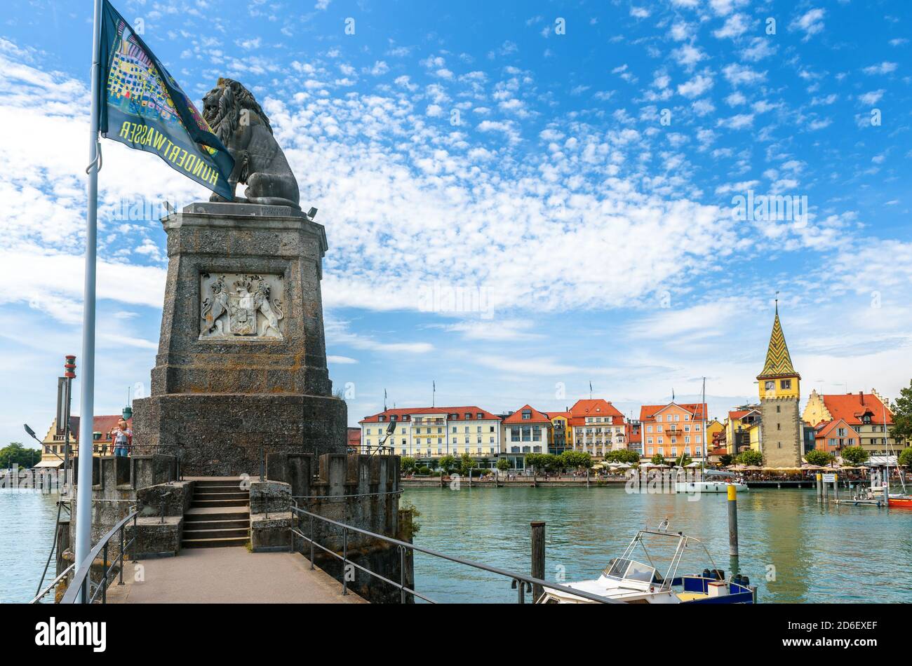 Lindau, Germany - July 19, 2019: Lion statue at harbor entrance on Lake Constance (Bodensee). Old town of Lindau is tourist attraction of Bavaria. Stock Photo