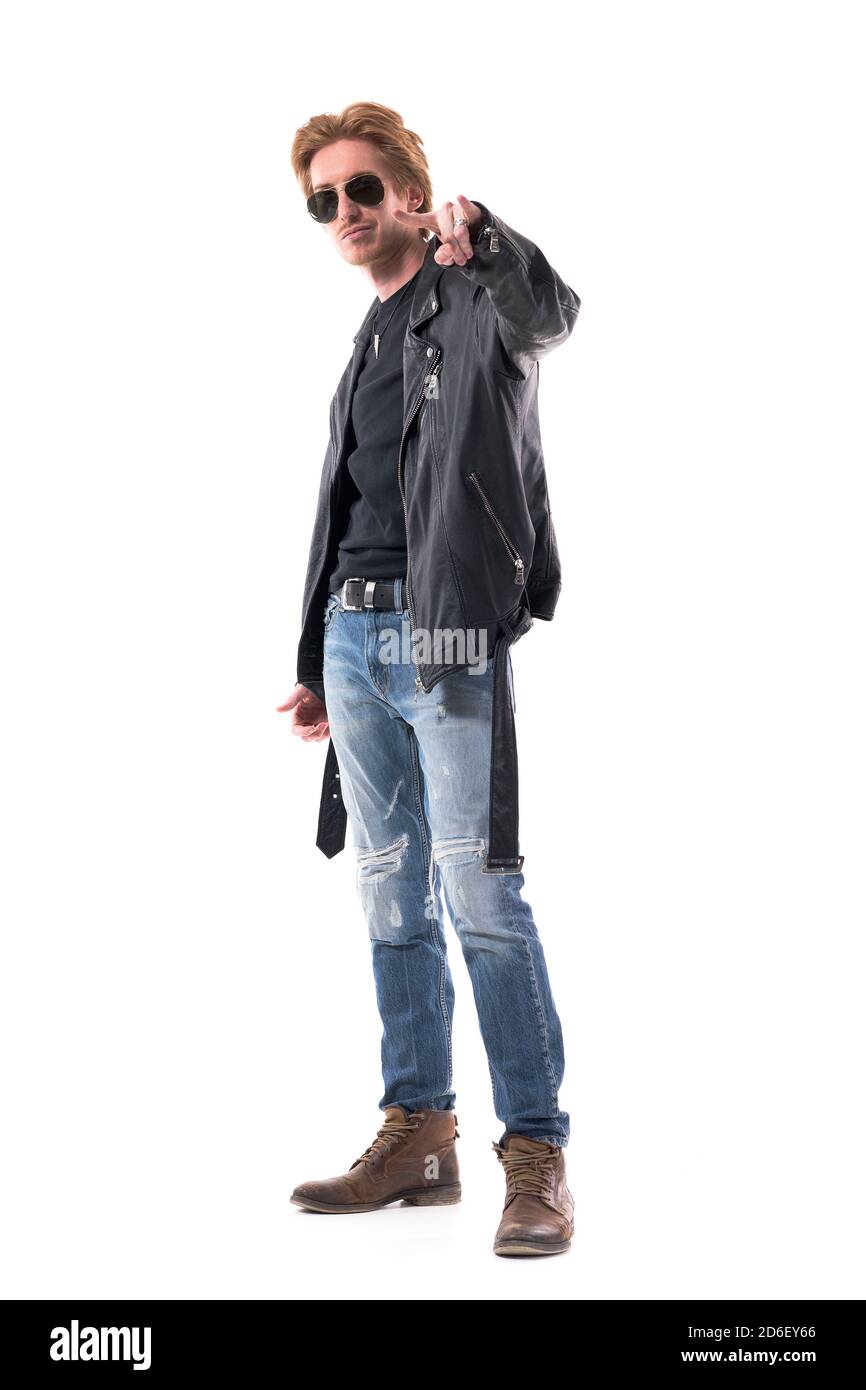 Stylish handsome cool macho rocker man showing heavy metal horns hand sign.  Full body isolated on white background Stock Photo - Alamy