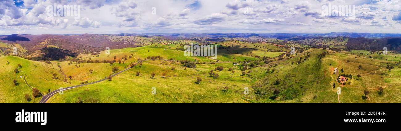 Lush green grazing properties in highlands plains valley near town Sofala in Central West of NSW, Australia. Stock Photo
