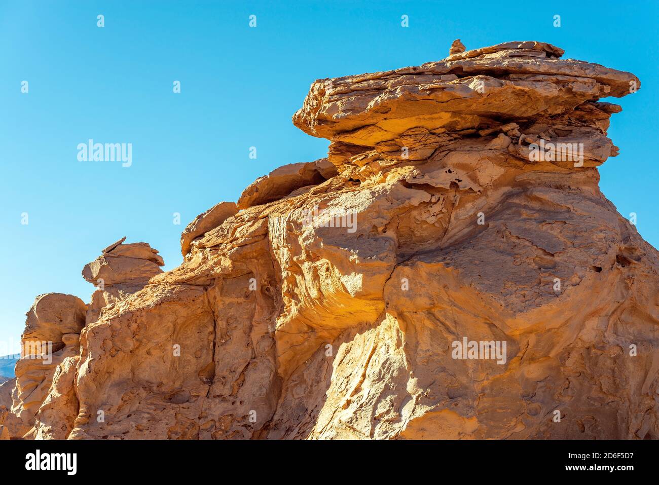 Rock formation due to wind erosion in the siloli desert, Eduardo Avaroa national reserve, Bolivia. Stock Photo