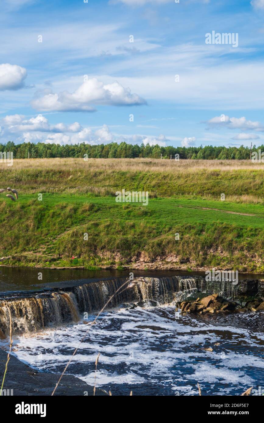 A stormy river with a brown hue. Stock Photo