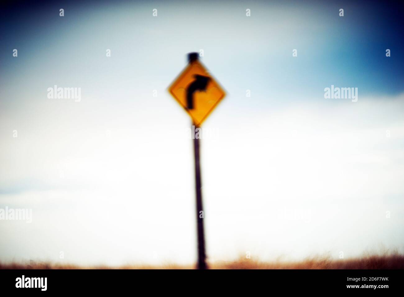 Blurred Directional Road Sign Stock Photo