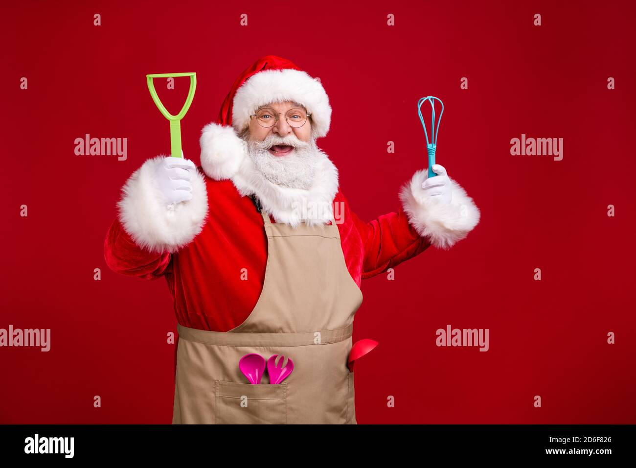 Photo of crazy modern funky santa claus chef hold x-mas cooking ...