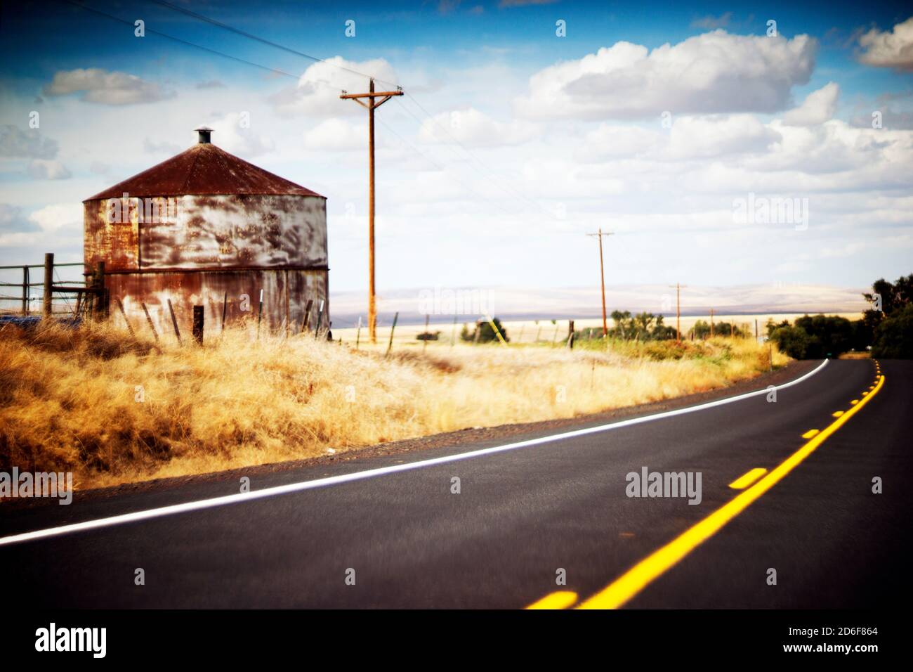 Rustic Agricultural Structure along Rural Highway Stock Photo