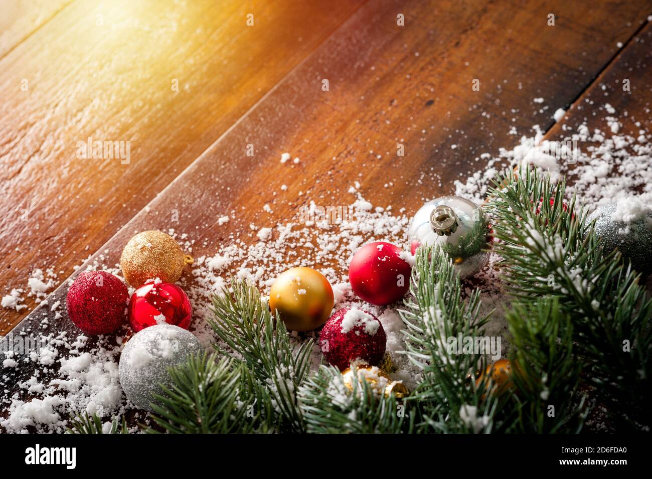 wooden background with fir tree branches and decorations, Christmas and ...