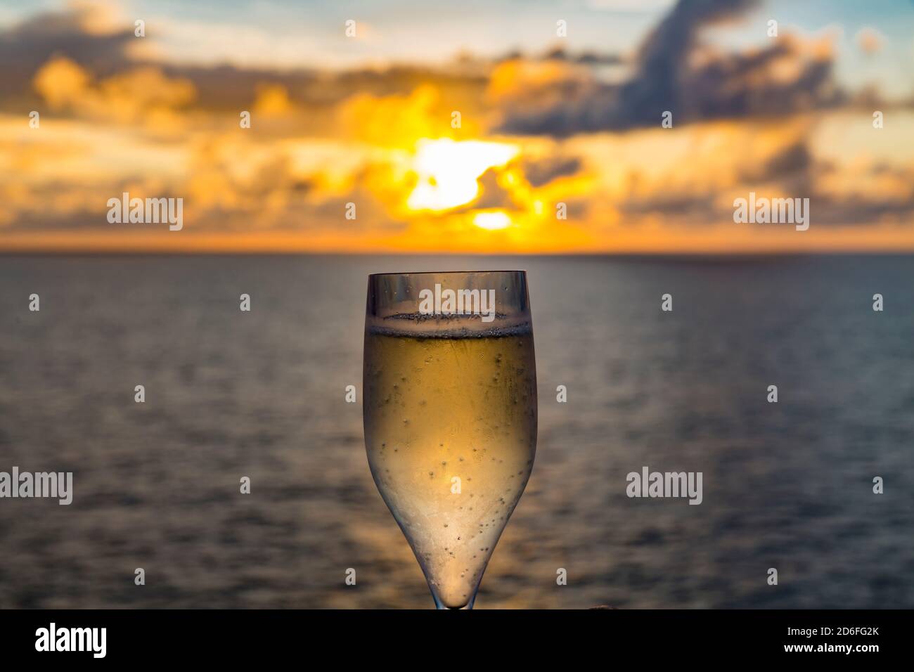 Champagne glass, sunset with storm clouds, near Reunion Island, France, Africa, Indian Ocean Stock Photo