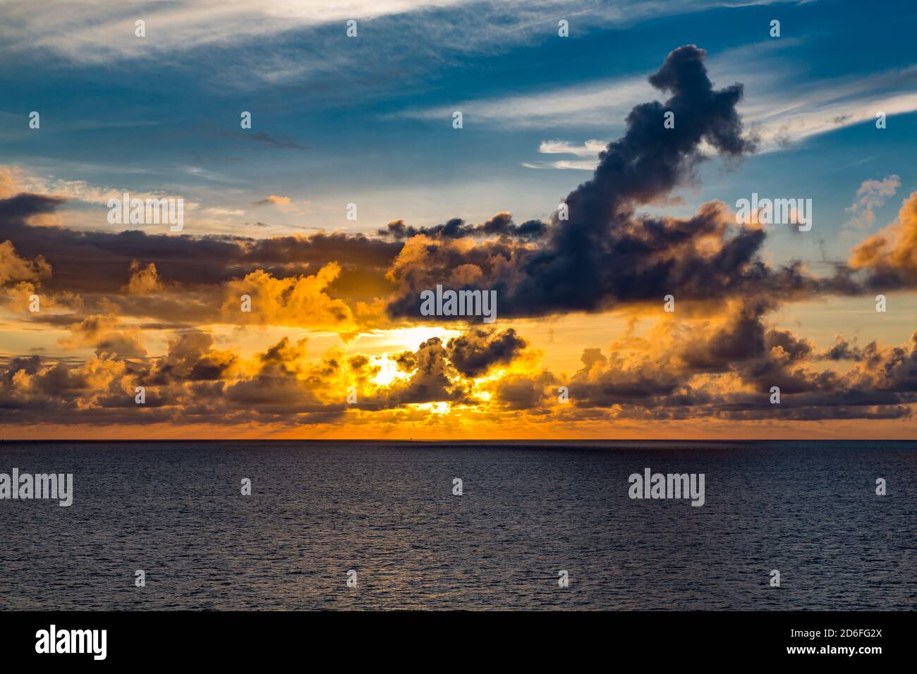 Sunset with storm clouds, near Reunion Island, France, Africa, Indian Ocean Stock Photo