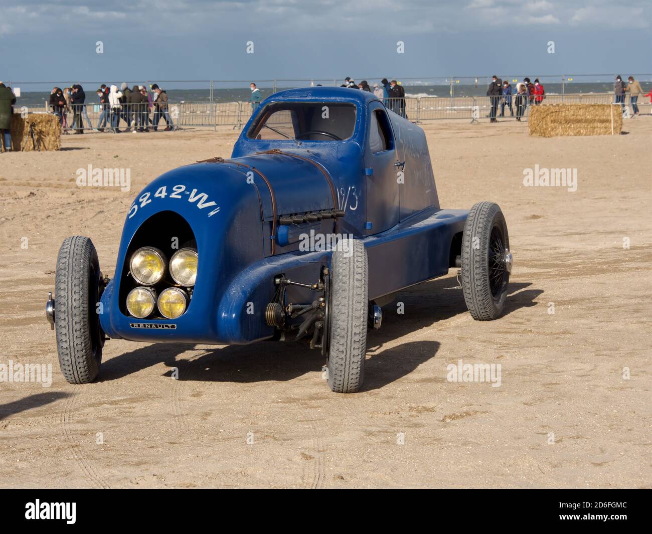 Old Renault car model on the beach of Normandy, France. Normandy Race Beach Stock Photo