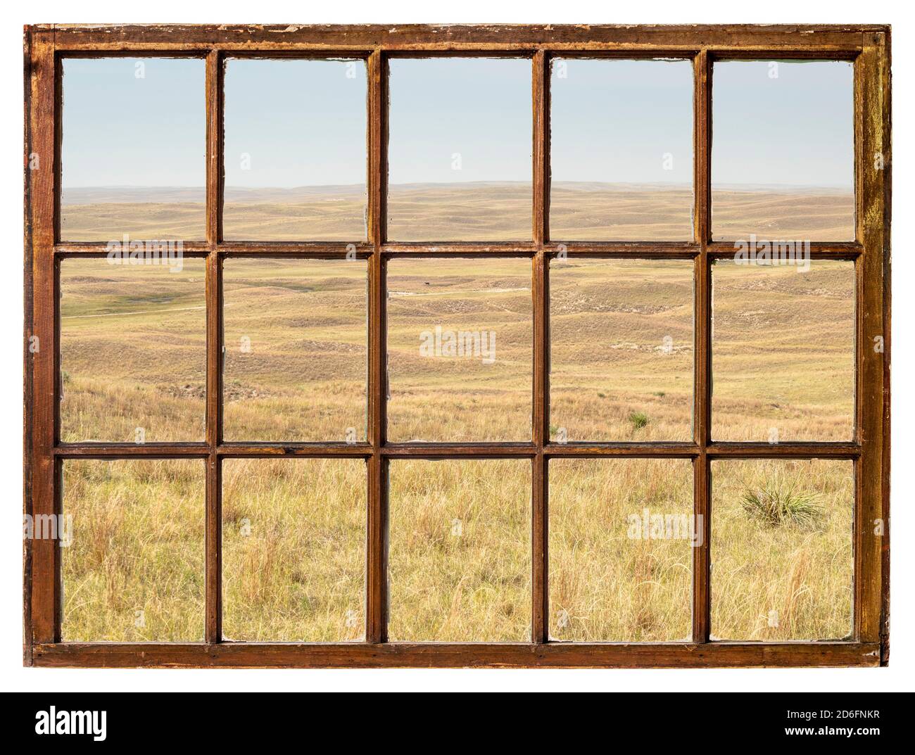 midday scenery of Nebraska, early fall scenery with haze from Colorado wildfires as seen from a vintage sash window Stock Photo