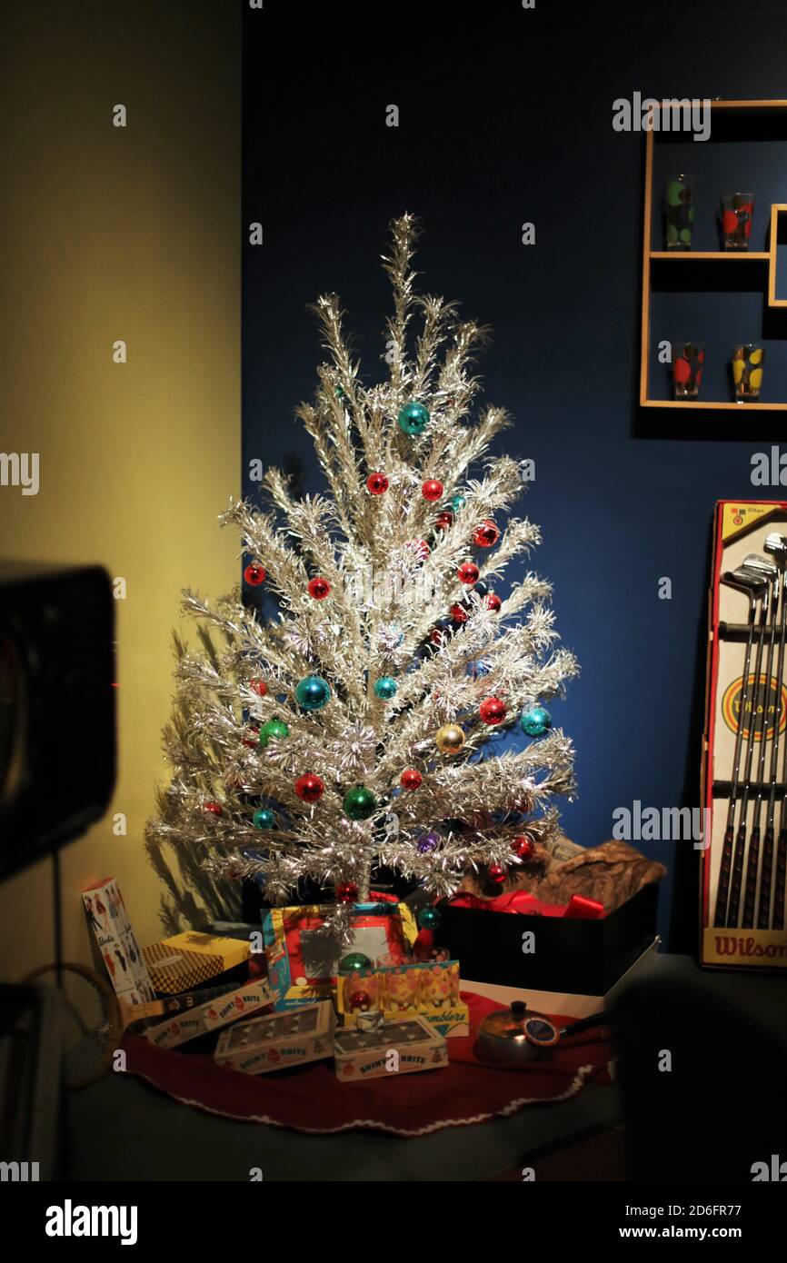 A 1950s Christmas living room scene with aluminum tree. Stock Photo