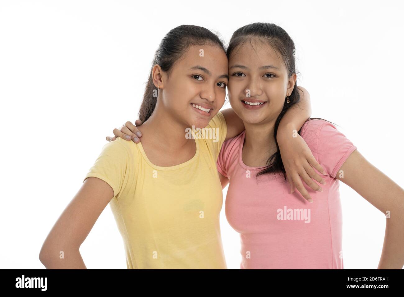 portrait happy from two young girl isolated in white background Stock ...