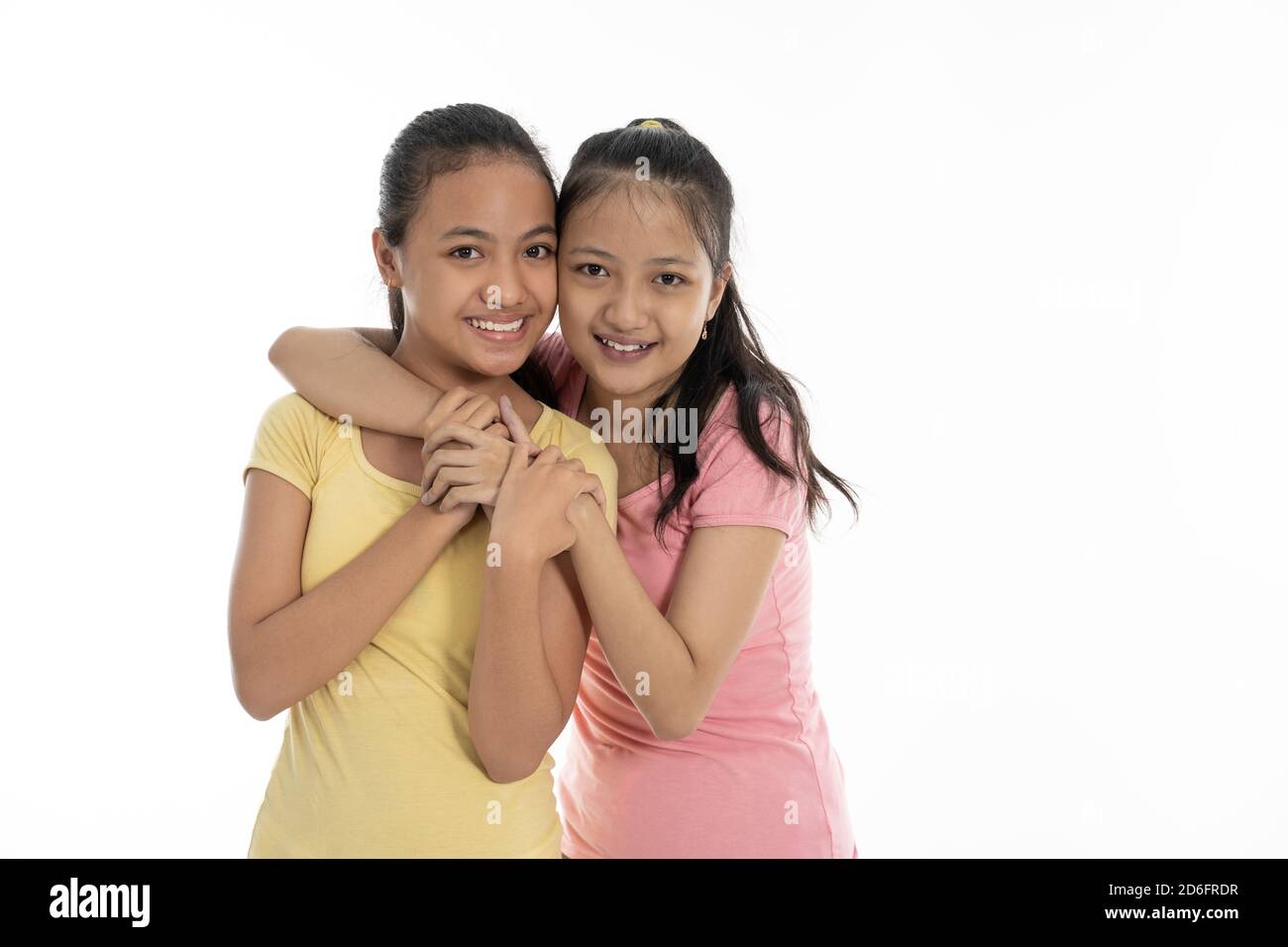 portrait happy from two young girl isolated in white background Stock ...