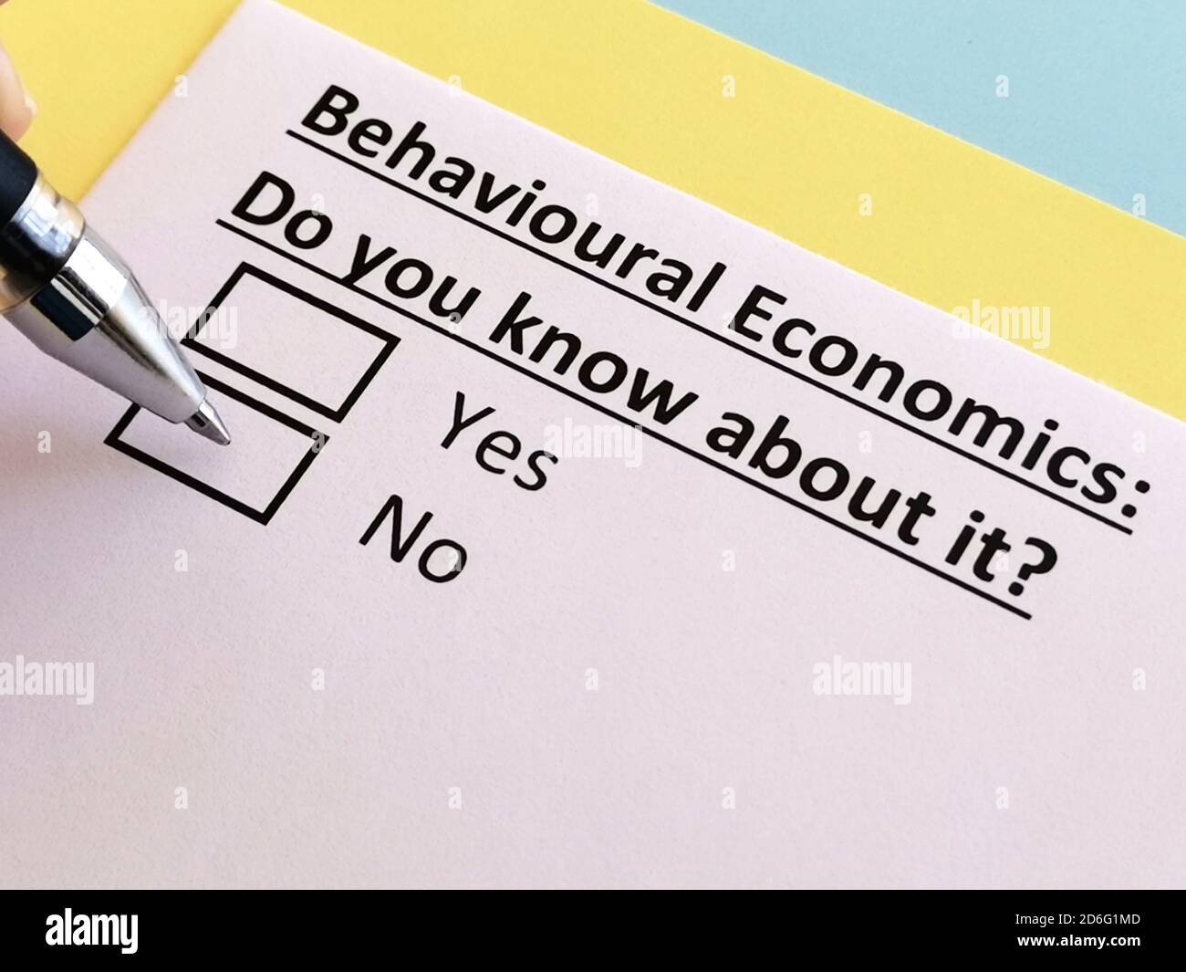 One person is answering quetion about behavioural economics. Stock Photo