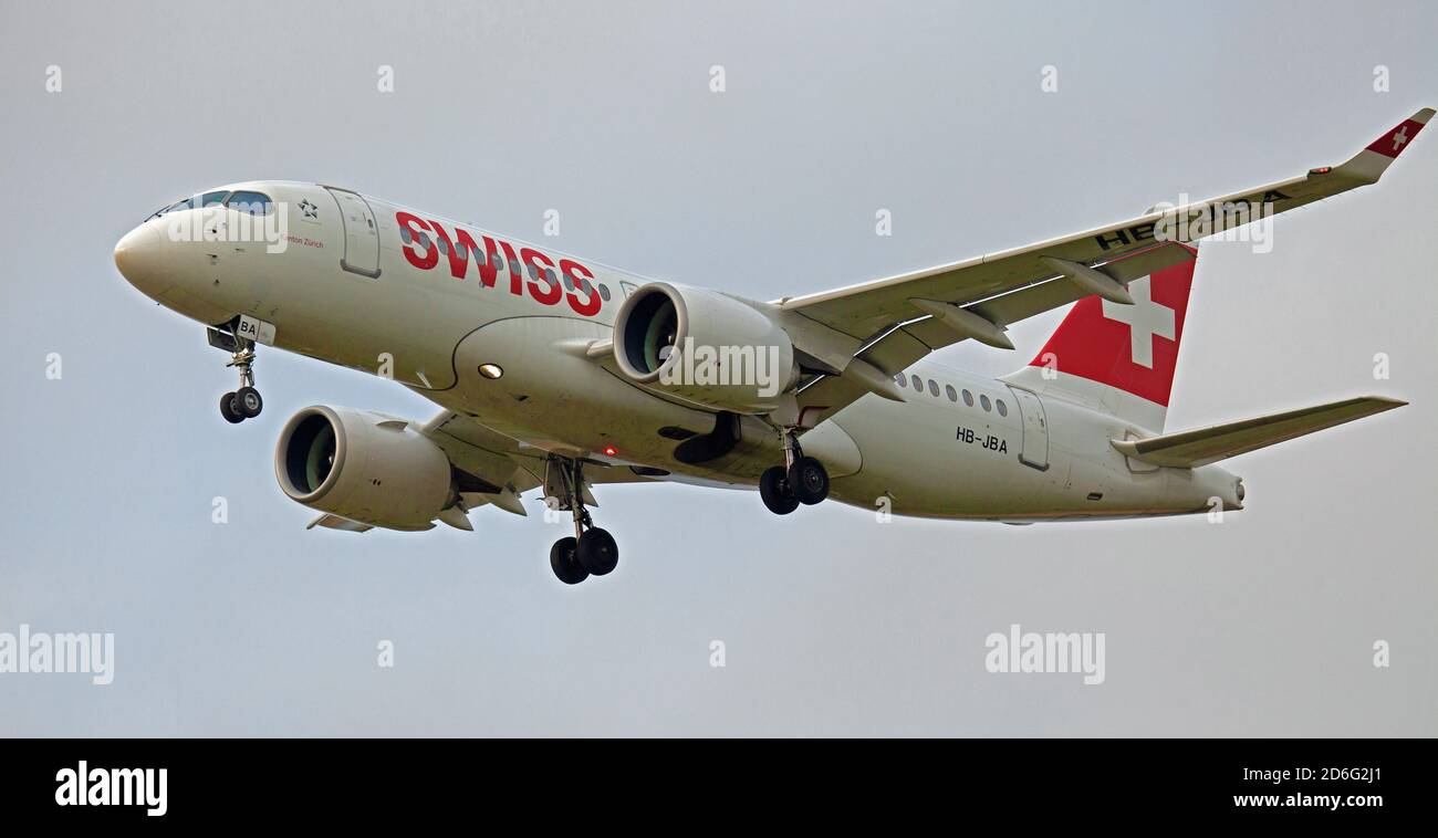 Swiss International Air Lines. Swiss Bombardier CS100 HB-JBA on final approach to London-Heathrow Airport LHR Stock Photo