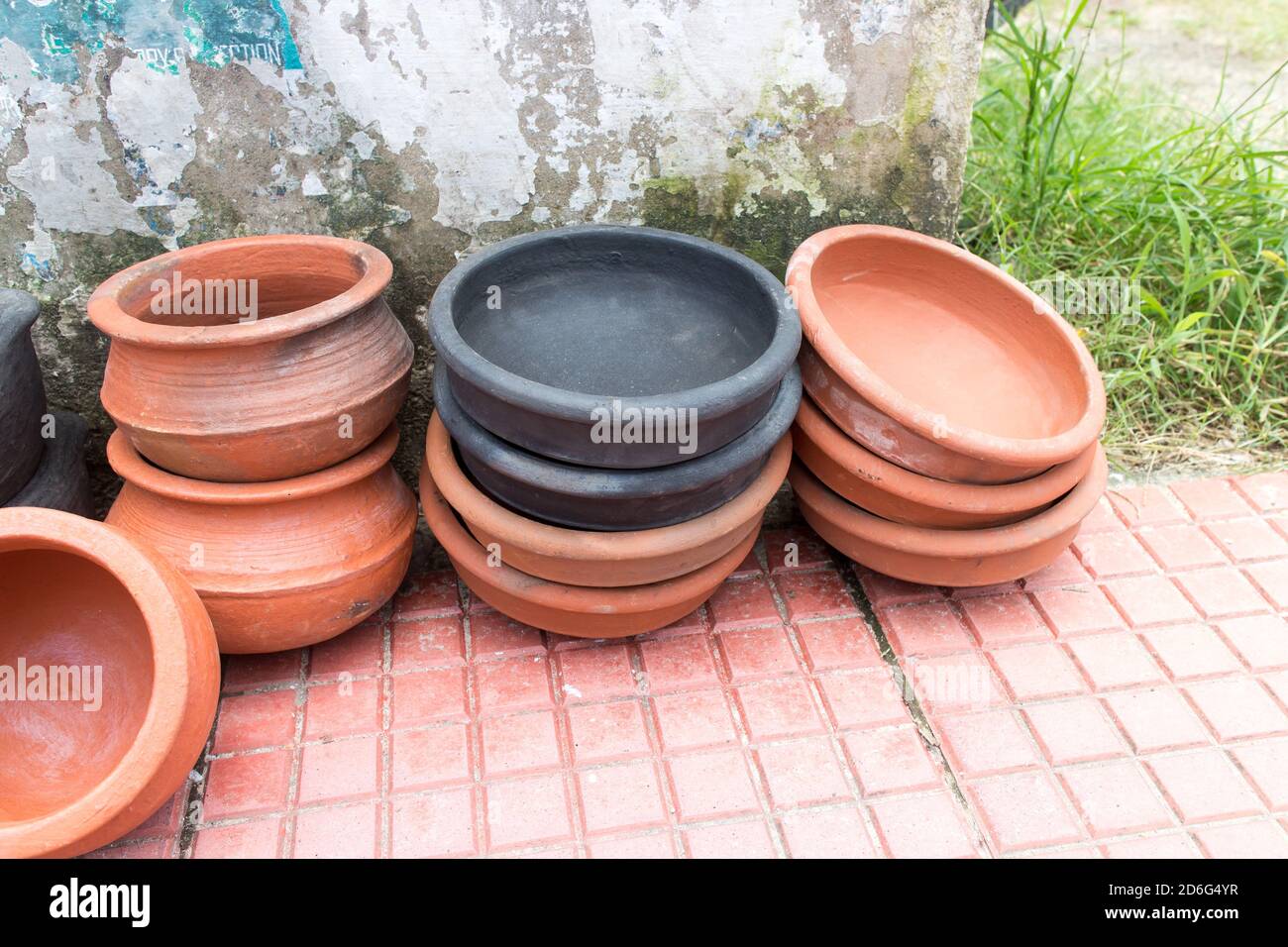 many clay pot make mud pottery on potters wheel. creating pots by shaping air  drying clay with both hands. mold with clay. practicing with modeling Stock  Photo - Alamy