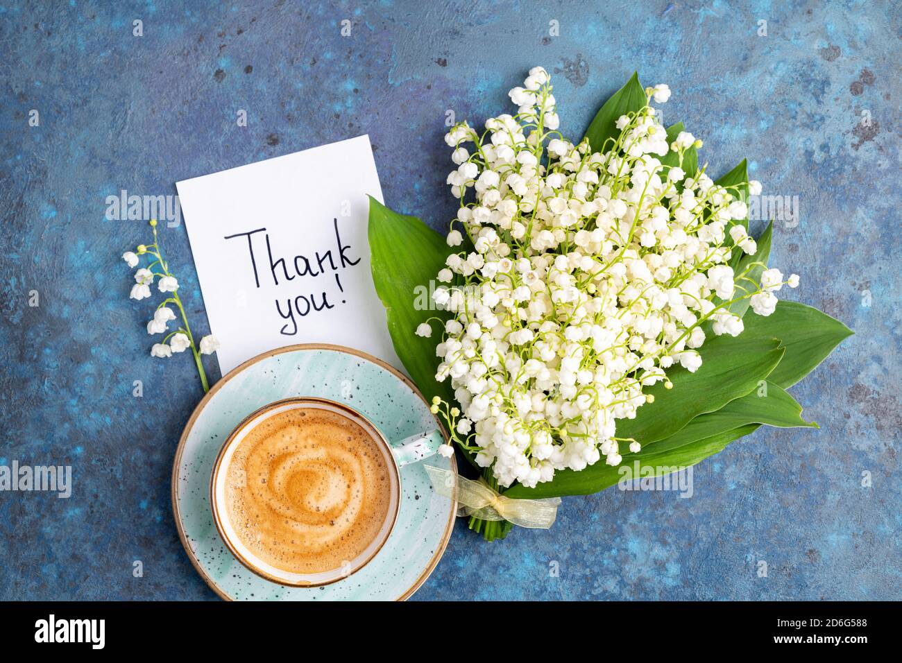 Notes thank you and coffee mug with bouquet of flowers lily of the ...