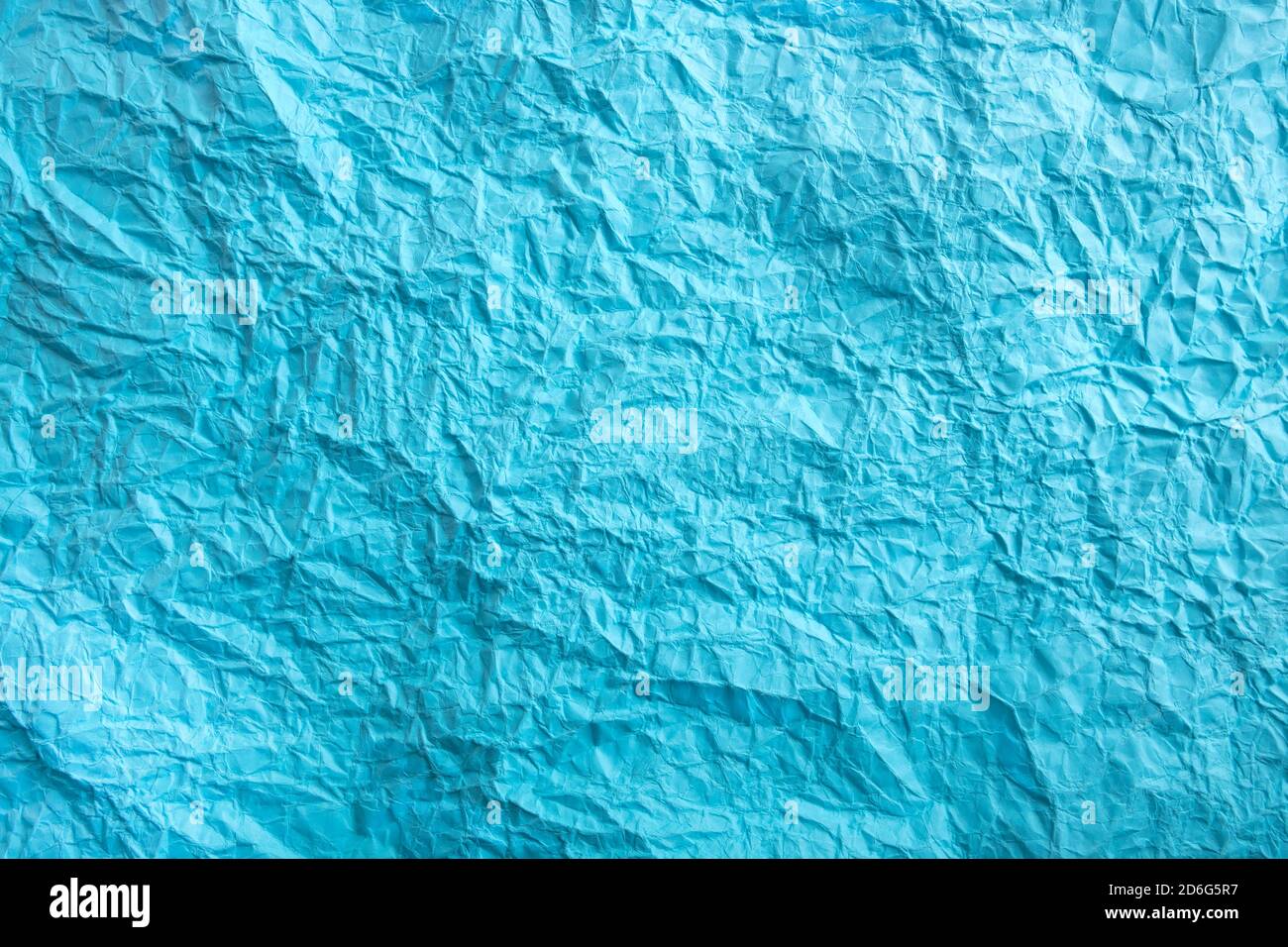 Crumpled paper texture. Twisted purple paper. Seamless pattern. Stock Photo