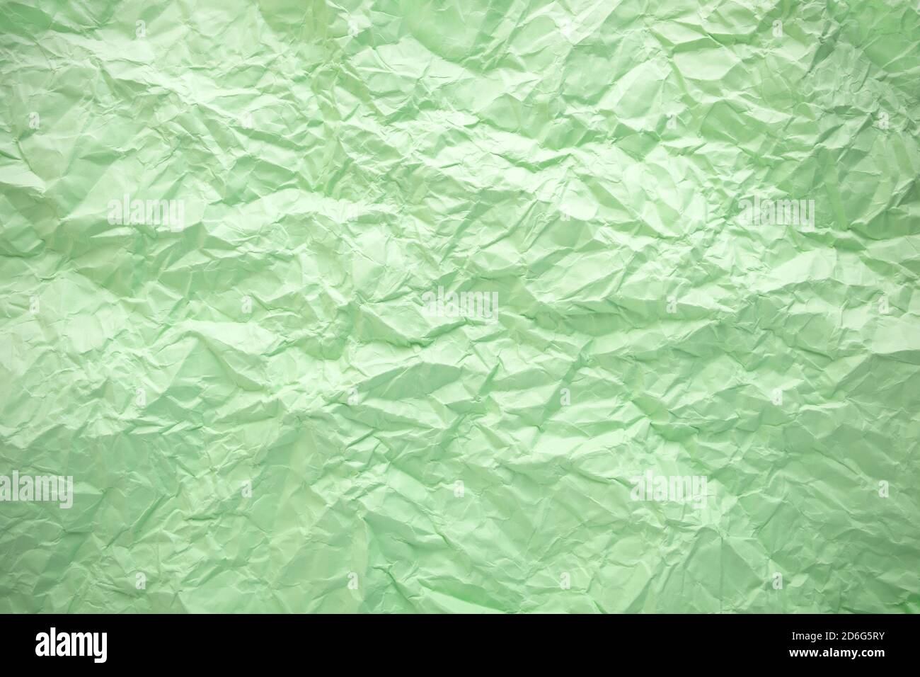 Crumpled paper texture. Twisted purple paper. Seamless pattern. Stock Photo