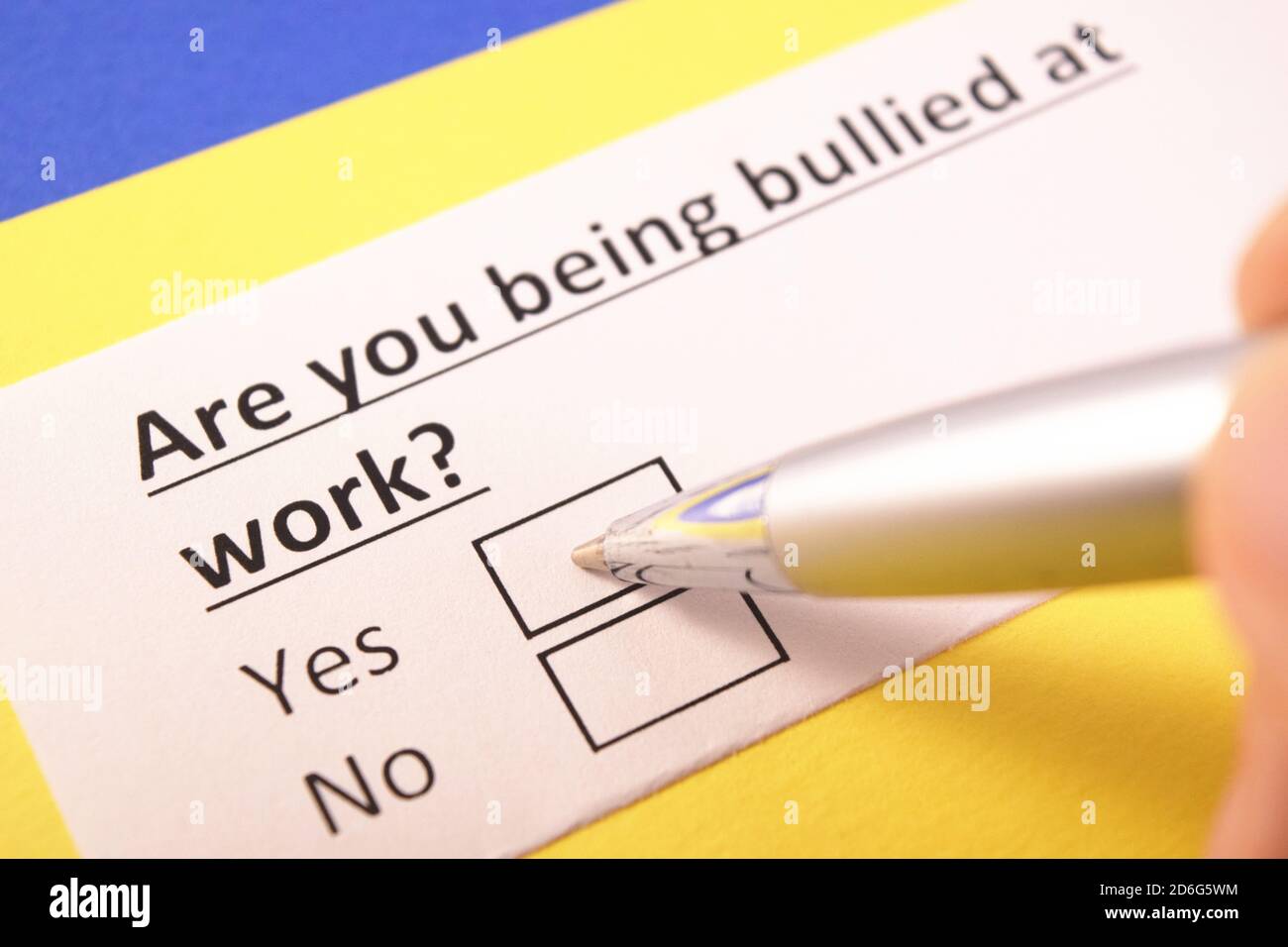 Are you being bullied at work? Yes or no? Stock Photo