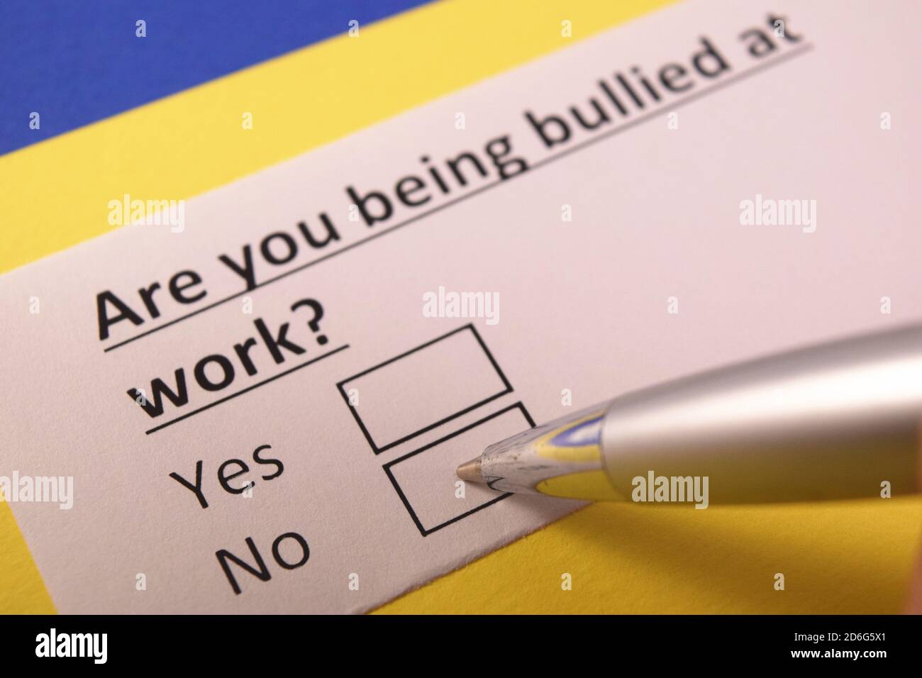 Are you being bullied at work? Yes or no? Stock Photo