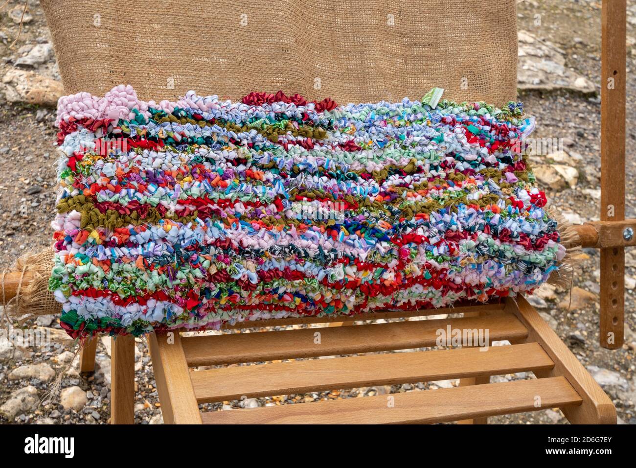 Rag rugging craft whereby old clothing and fabric scraps are cut up and woven through a hessian