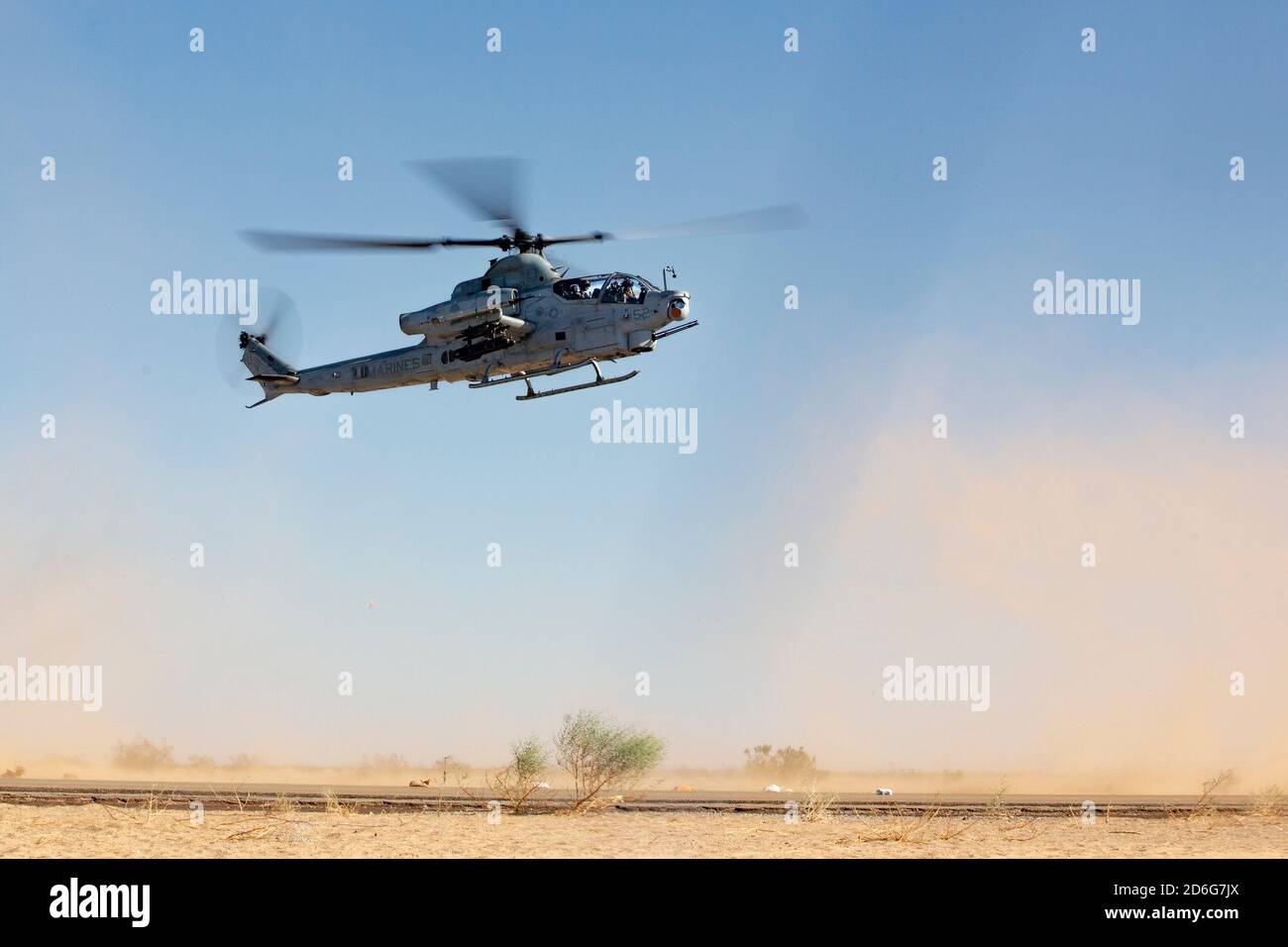 A U.S. Marine Corps AH-1Z Cobra assigned to Marine Aviation Weapons and Tactics Squadron One (MAWTS-1), participating in Weapons and Tactics Instructor (WTI) course 1-21, takes-off from a forward arming and refueling point at Auxiliary Airfield II, in Yuma, Arizona, Oct. 12, 2020. The WTI course is a seven-week training event hosted by MAWTS-1, providing standardized advanced tactical training and certification of unit instructor qualifications to support Marine aviation training and readiness, and assists in developing and employing aviation weapons and tactics. (U.S. Marine Corps photo by Cp Stock Photo