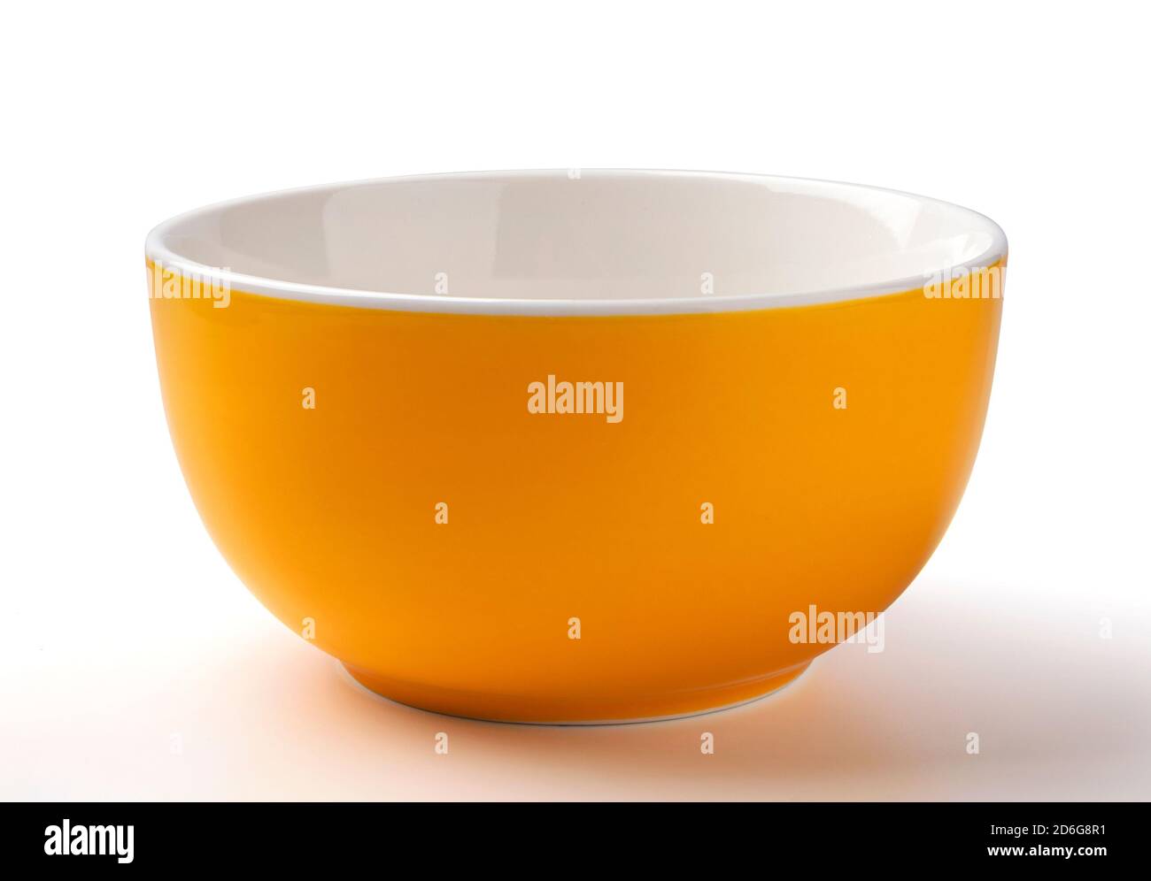 Empty yellow bowl isolated on white background Stock Photo