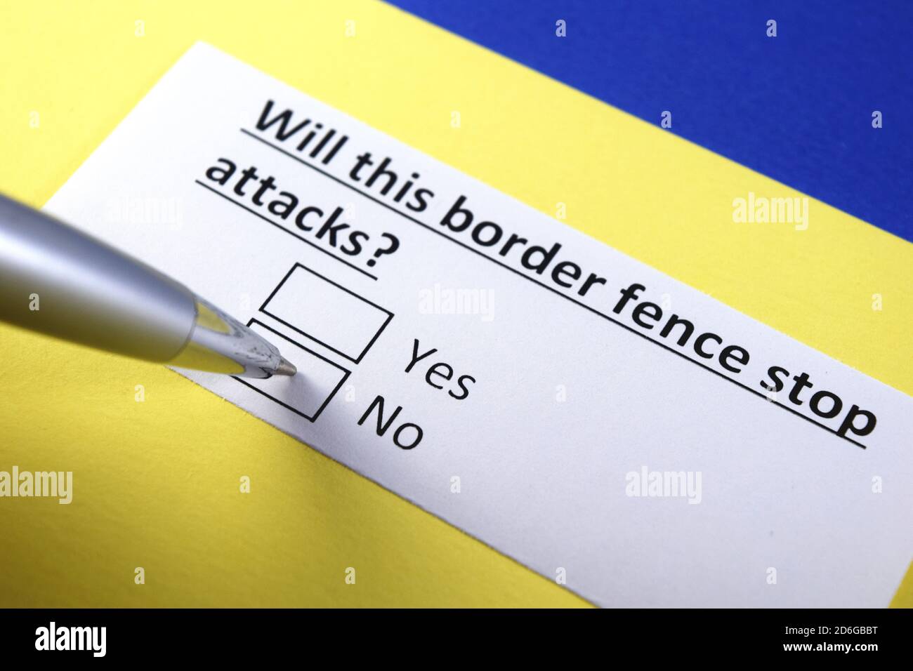 Will this border fence stop attacks? Yes or no? Stock Photo