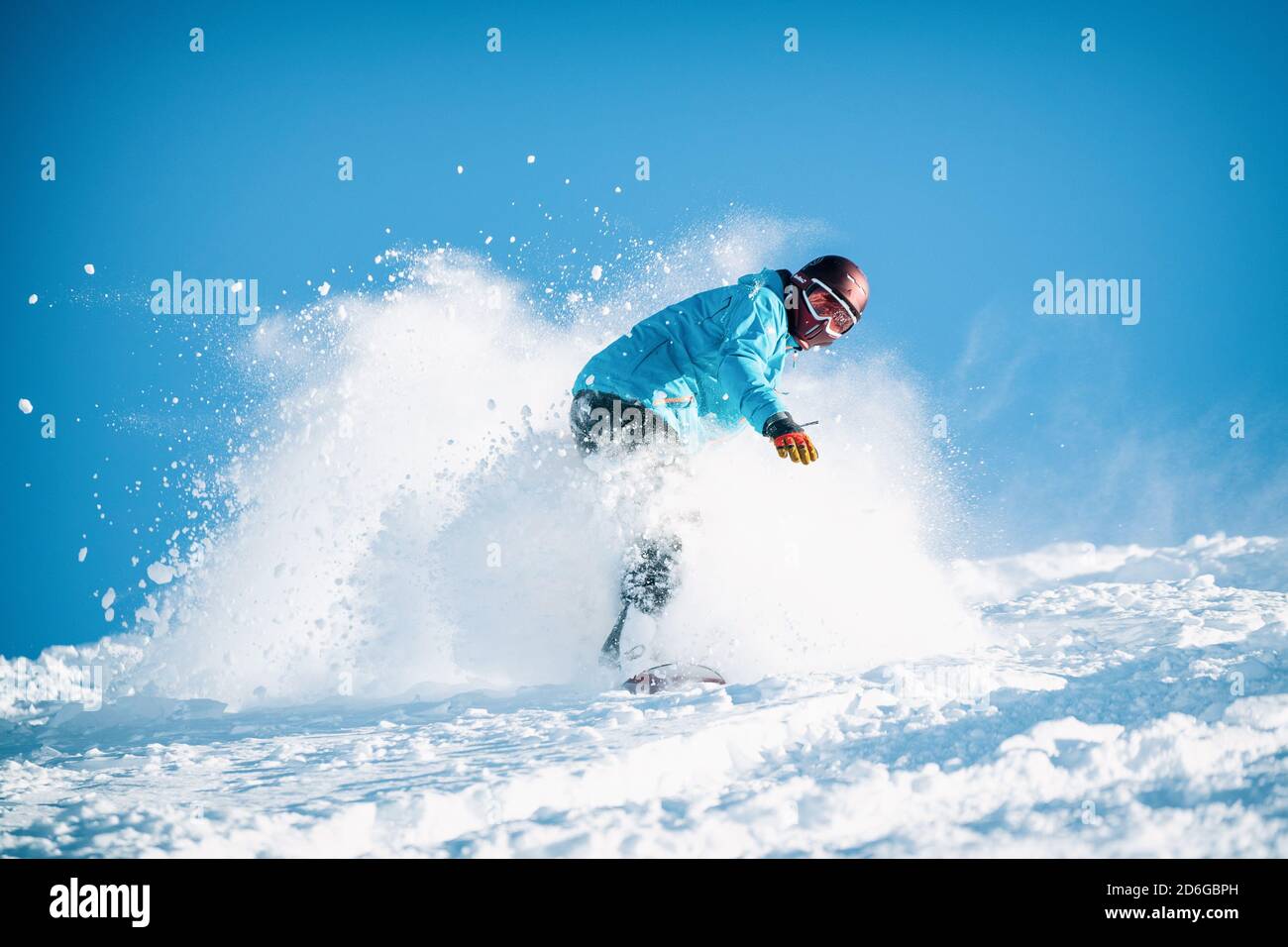 Freeride powder, snowboarding in Les deux alpes resort in winter, mountains in French alps, Rhone Alpes in France Europe Stock Photo