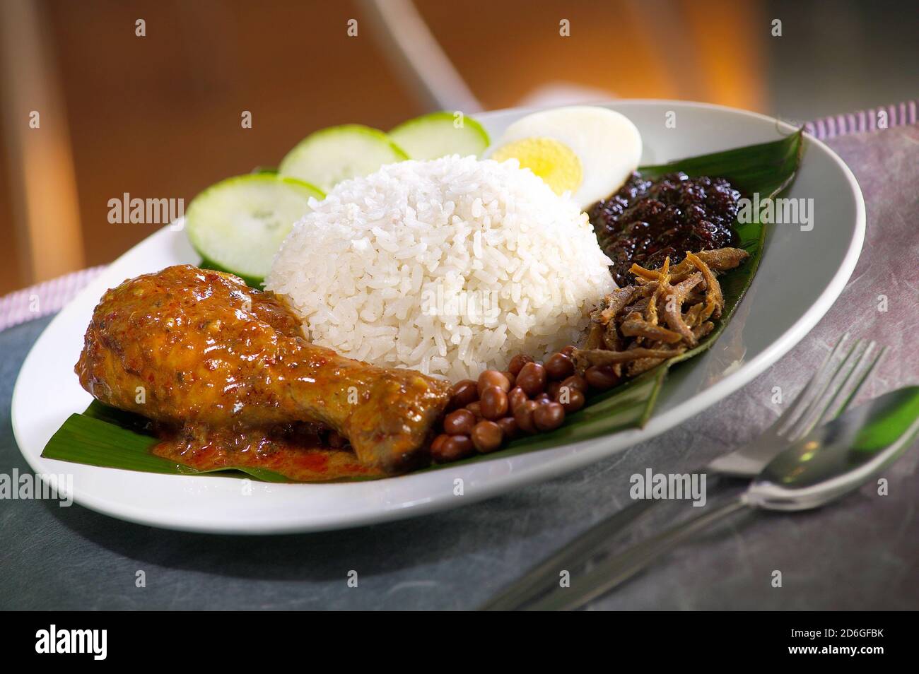 Asian food nasi lemak with chicken curry Stock Photo