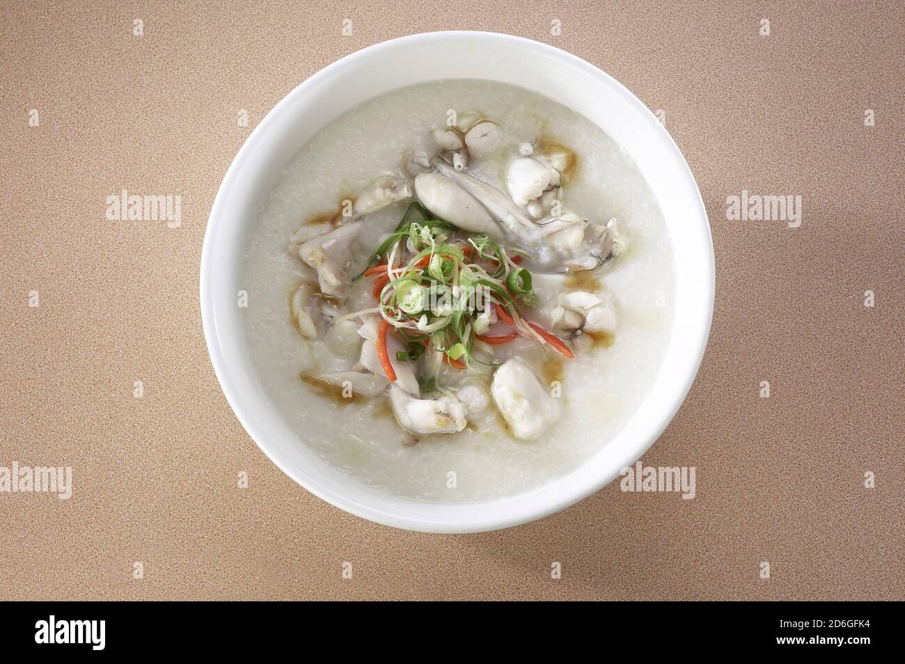 Congee or porridge with frog meat Stock Photo