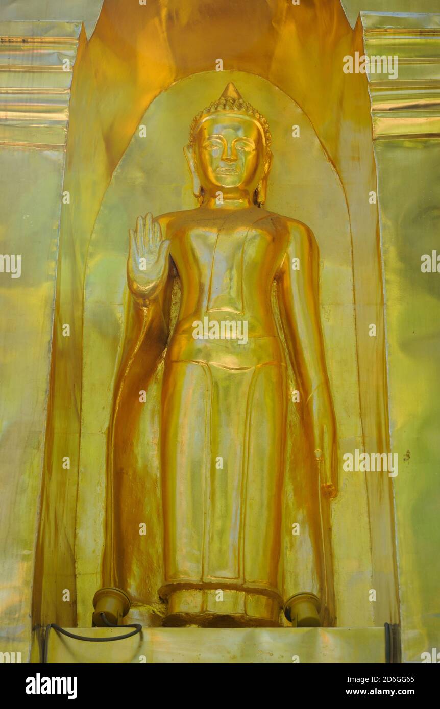 Gilded statue of the Buddha at Wat Phra Singh, Chiang Mai, Thailand Stock Photo